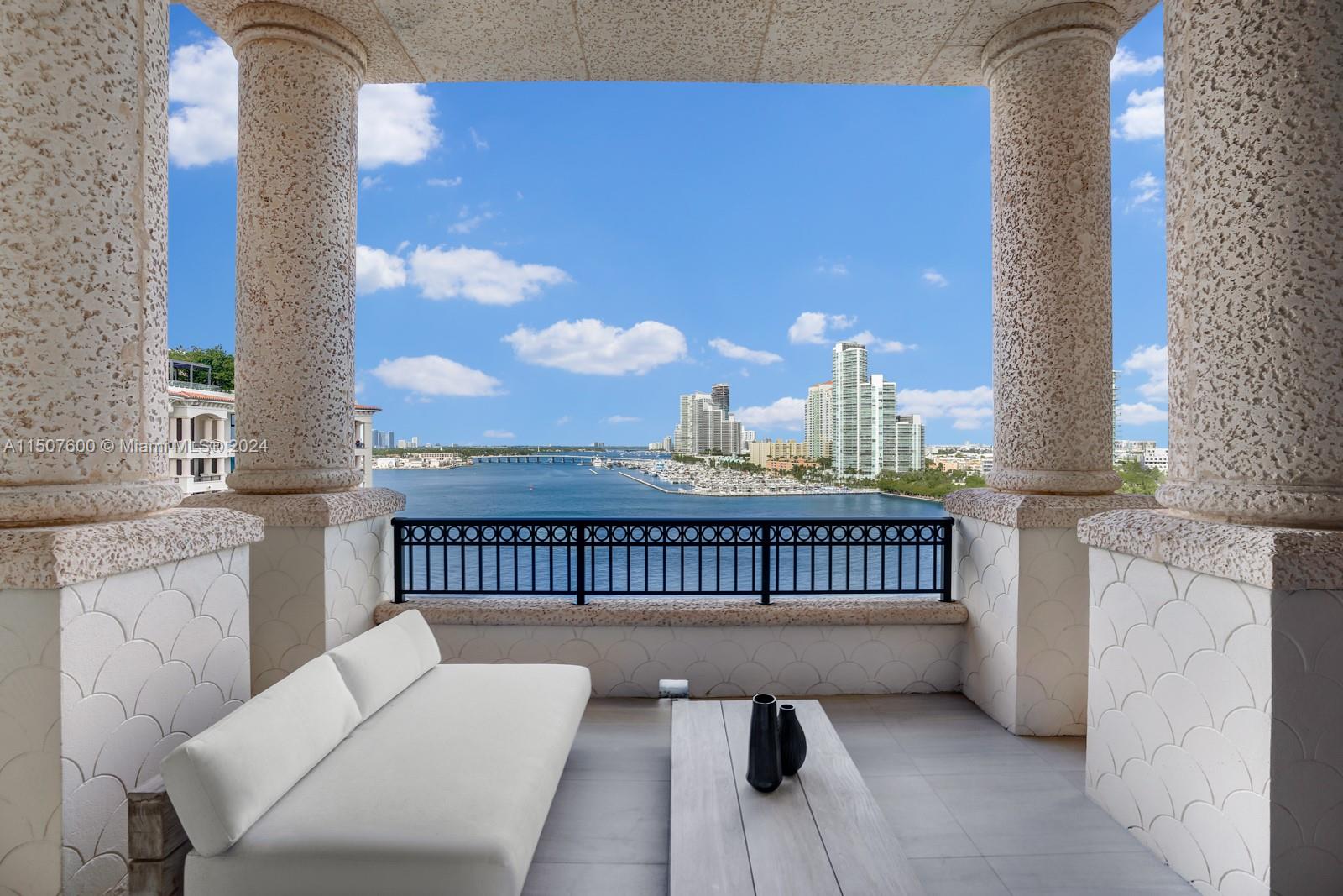 Step Inside With Me! Sol Penthouse I on the ultra exclusive 216-acre Fisher Island. The definition of design and grandeur, this sky estate totals 5 suites and 7,000 SF of crafted interiors. The opulent foyer opens to a great room with soaring ceilings and oak herringbone flooring. Impeccably positioned toward the sunset, skyline, and ocean, views are enhanced by picturesque glass pocket doors. Four glamorous social areas include a hosting salon, bayfront bar, TV room, and formal dining. The sleek contemporary Gaggenau kitchen displays a dine-in island, wine cellar & Art Deco detailed hood. Equipped with a Bang & Olufsen sound system, the media den is the ultimate viewing experience. The terraces offer an additional 5,000+ SF with a rooftop pool, hot tub, firepit & Summer Kitchen.