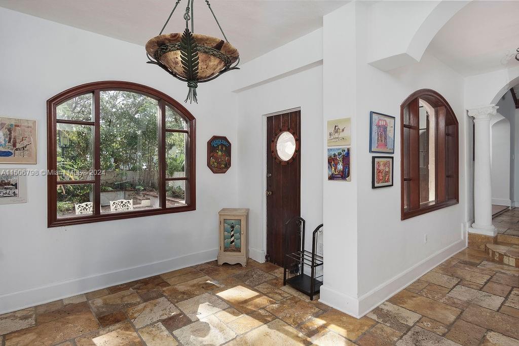 FOYER, LAUNDRY ROOM AND STORAGE/OFFICE