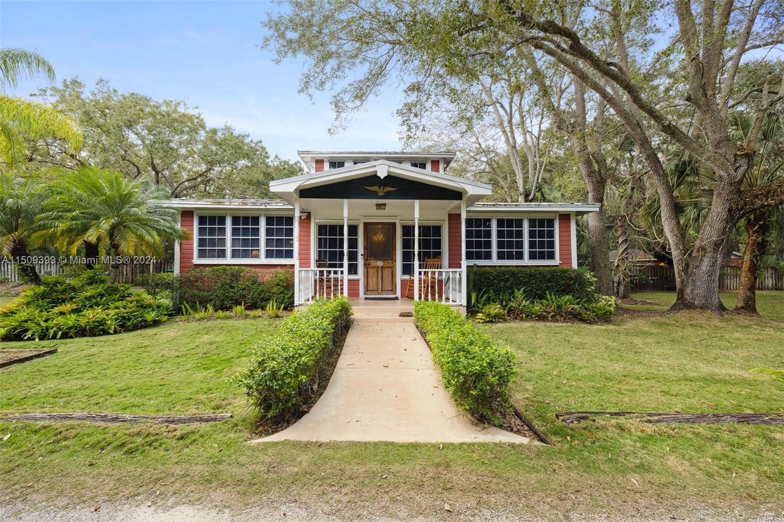 Old Florida Home on 1.92 acres in Palmetto Bay! Crown jewel looking for only its fourth homeowner ever. Improve the existing structure and enjoy all that is South Florida living. Or, build your statement home on this beautiful piece of land. Walk to Coral Reef Park, Southwood Middle School. Once in a lifetime opportunity to lay claim on a unique home and property. Great for hosting large gatherings, a pool, a chickee hut and a gorgeous yard offer quiet enjoyment. The coolest residence in Palmetto Bay makes for a complete family compound. Live, love, laugh, work from home, study at home, play and mingle with multiple generations. Plenty of room for parking your boat or RV. 5 car garage or storage, you decide. Tin roof installed after Andrew. Click tour to see the 3D virtual tour.