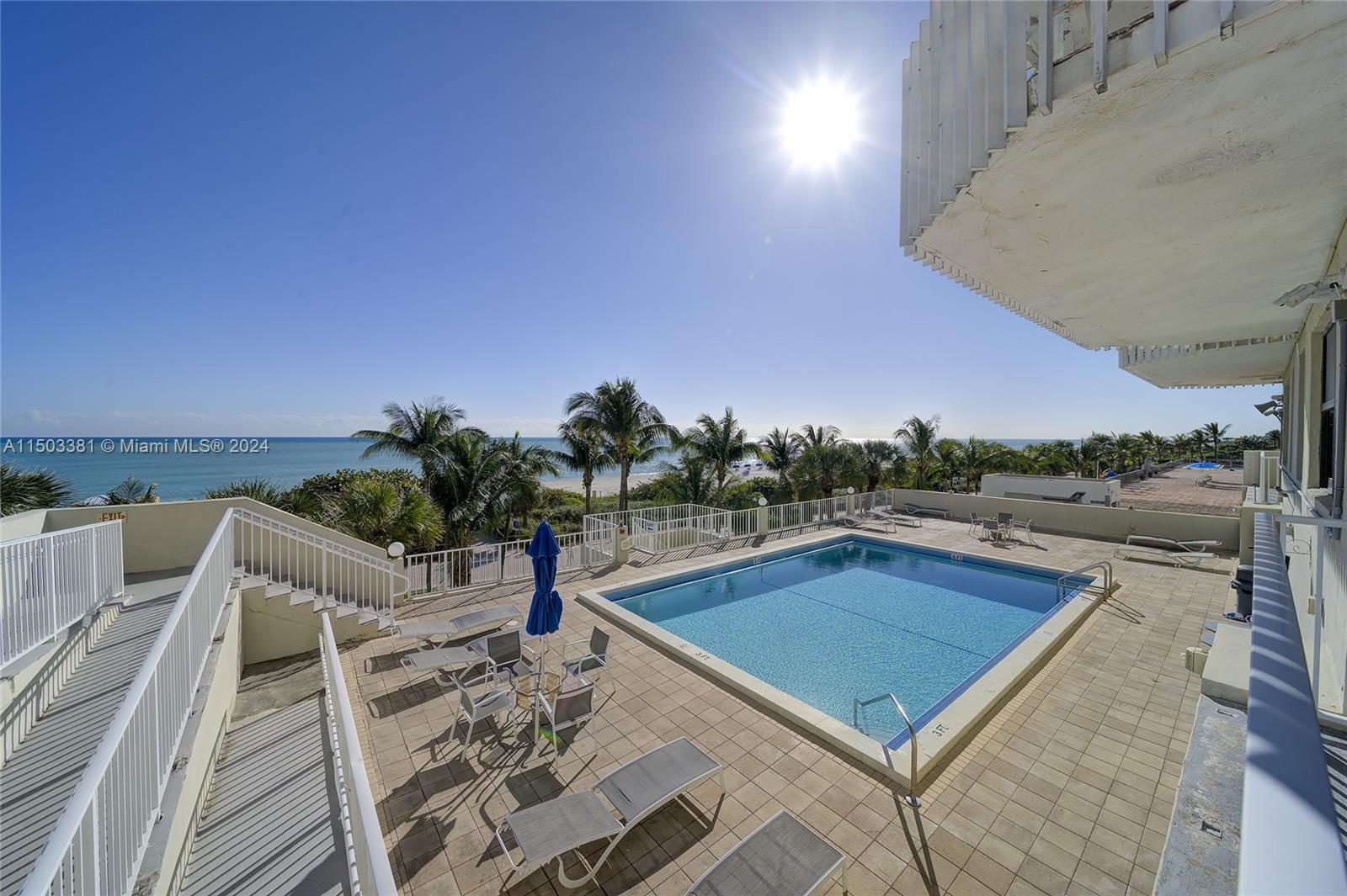 beach view pool with walk way to beach walk and sand!