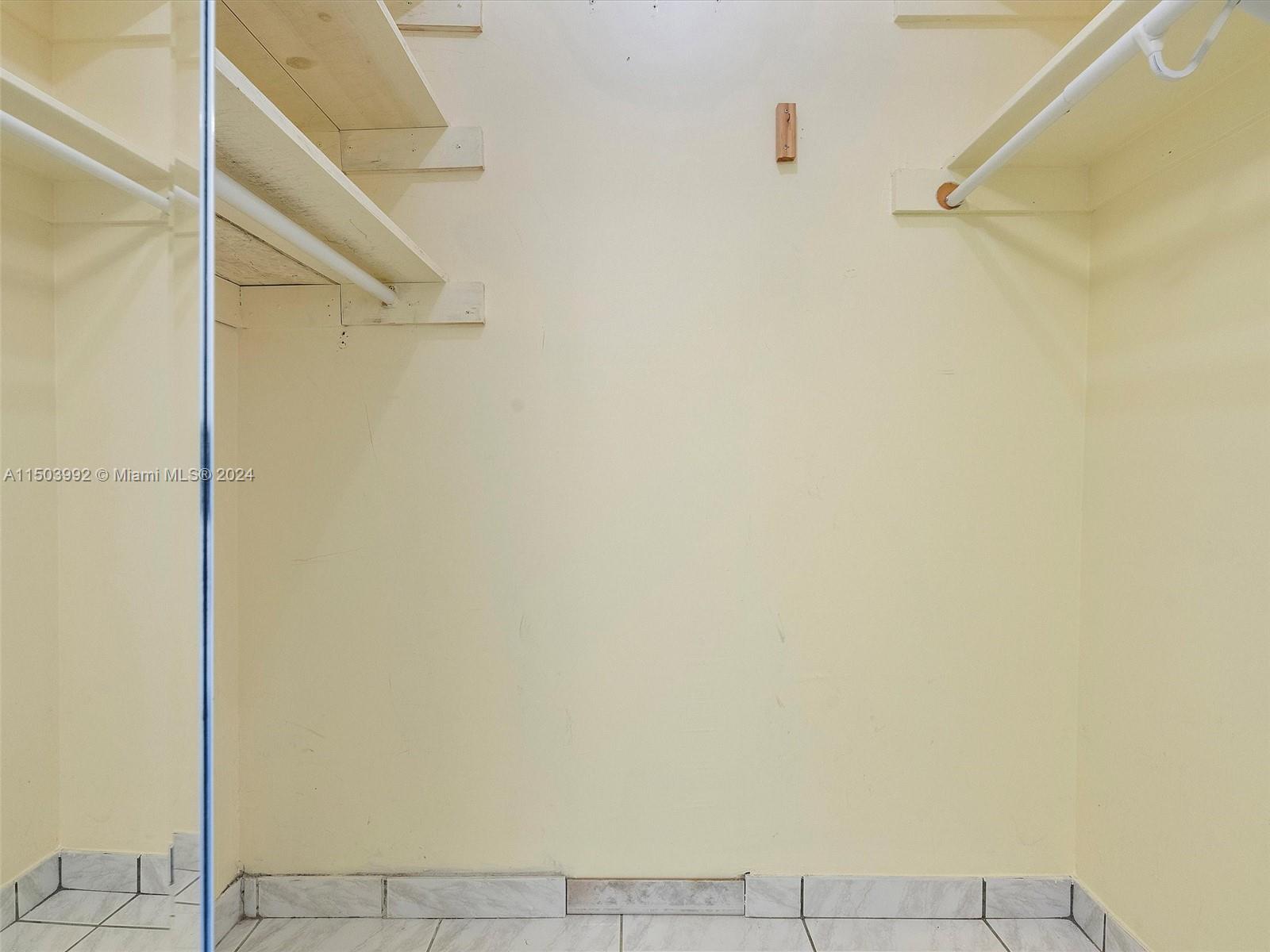 guest  bedroom walk in closet