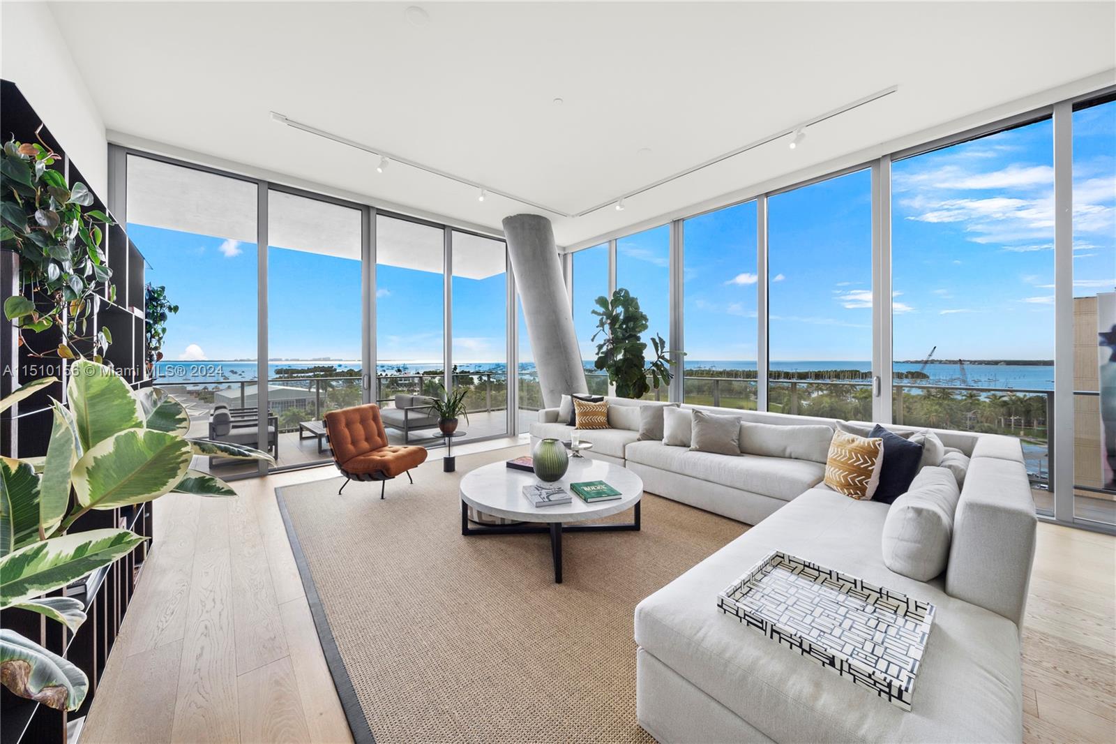 Welcome to Unit 702S at the Grove at Grand Bay in Coconut Grove. This stunning 3,929 SF property is being offered FULLY FURNISHED (art excluded), 4 beds+staff, 5.1 baths, and exquisite finishes. Enjoy panoramic views of Biscayne Bay & the Miami skyline featuring 12-ft-high, floor-to-ceiling glass leading to wraparound terraces that are 12 ft deep. A spacious primary bedroom w/ ocean views & an expansive walk-in closet & primary bath. W/ 3 additional bedrooms, each w/ ensuite baths & closets + an extra service bed w/ full bath & powder bath. The kitchen is a chef's dream w/ top-of-the-line Miele appliances. Residents can enjoy the best amenities, from concierge services to a restaurant, spa, fitness center, swimming pool & walking distance to some of the best school's in Miami.