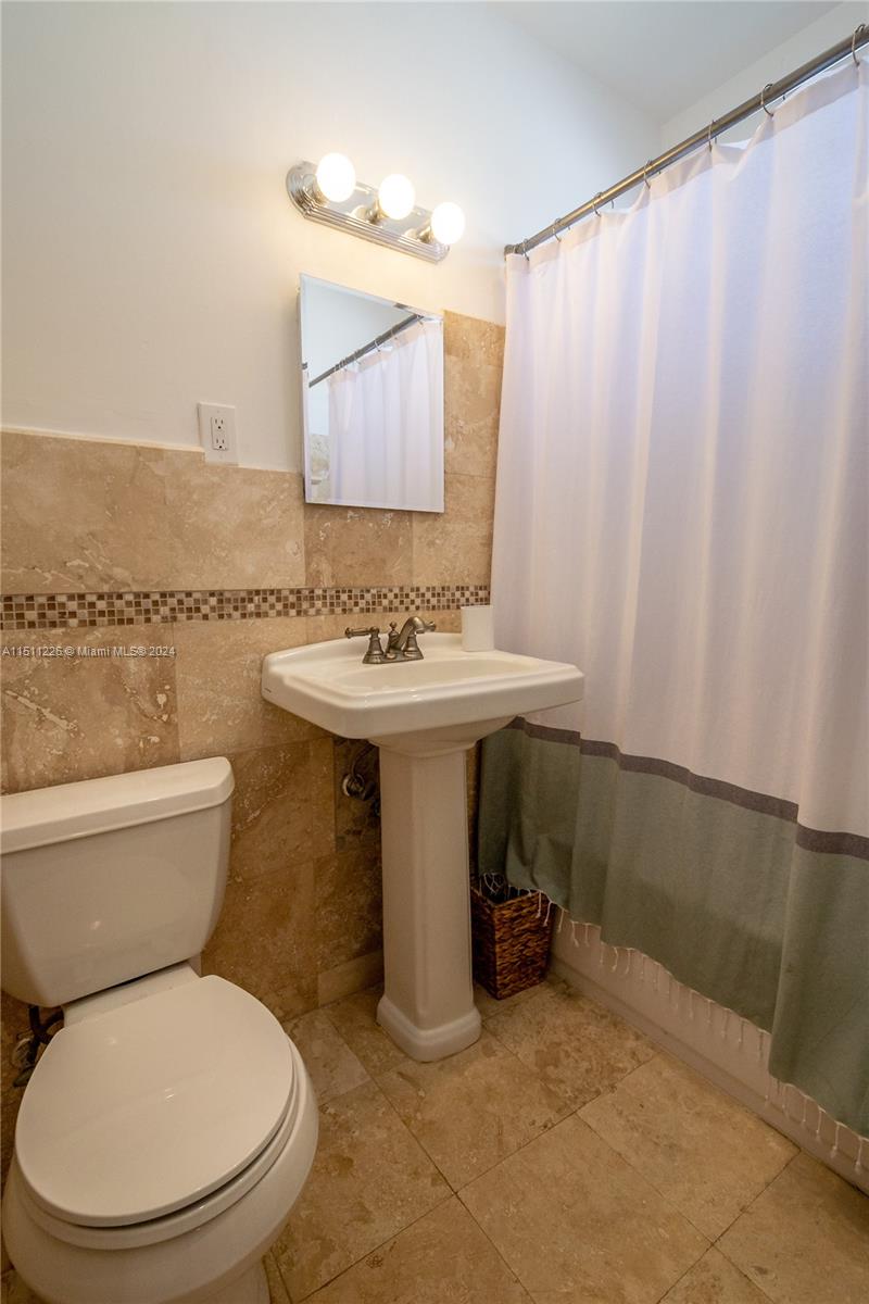 Picture took when unit was bought. Tenant's furniture today is different.