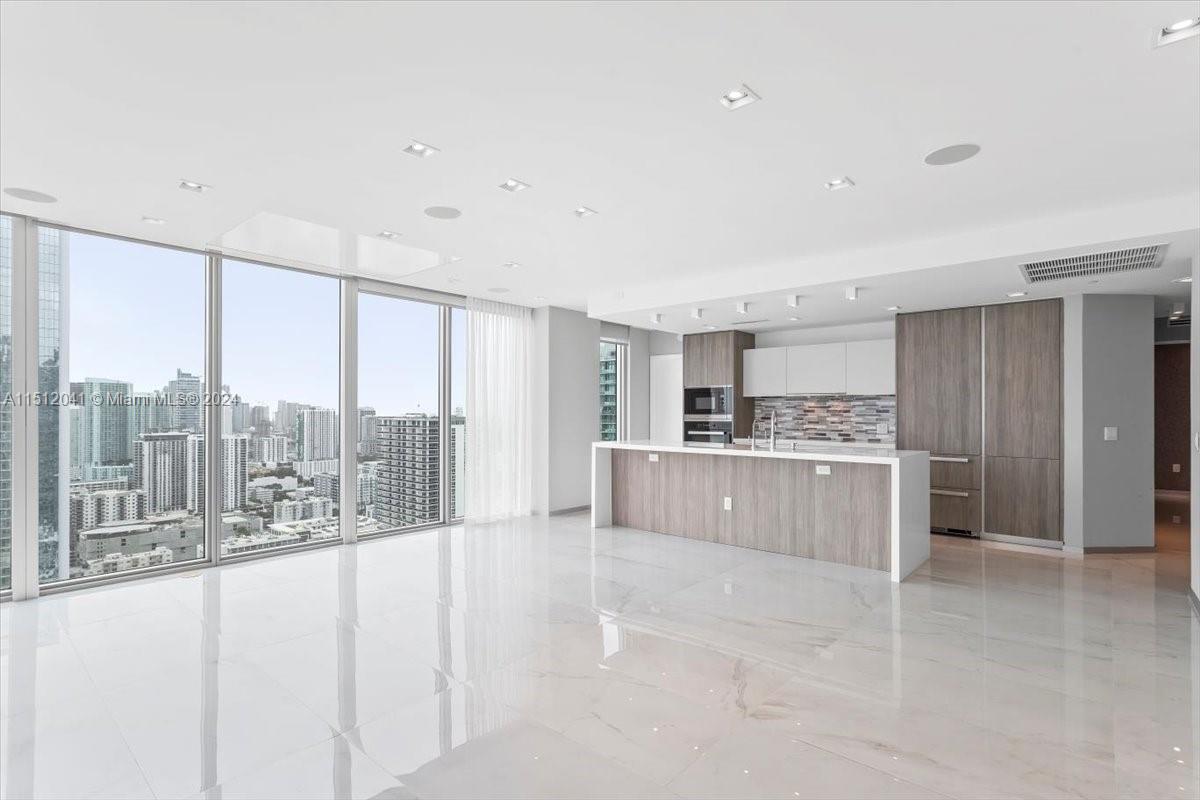 Top-of-the-line 3-bedroom + den and 4 full bathrooms unit in Biscayne Beach. Unit 3707 boasts breathtaking views of Biscayne Bay and the Miami Skyline. Enjoy top-notch kitchen finishes, Snaidero cabinetry, and Miele appliances. Floor-to-ceiling glass windows provide unobstructed bay views. The building offers 5-star amenities, including a beach club, two pools, two tennis courts, cabanas, a state-of-the-art gym, a dog park, a beauty salon, and a business center. The unit has been tastefully renovated with drop ceilings throughout, upgraded lighting, and wallpaper. It also features conveniences like an ice maker and a fresh washer dispenser. THERE ARE 3 ASSIGNED PARKING SPACES IN A PRIME LOCATION AND A STORAGE UNIT AS WELL.