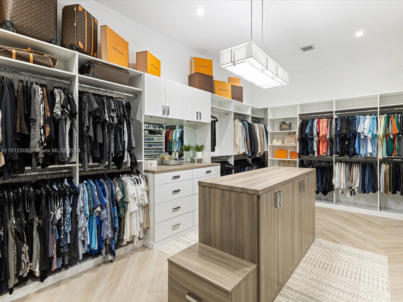 Primary Bedroom His and Hers Closet Two