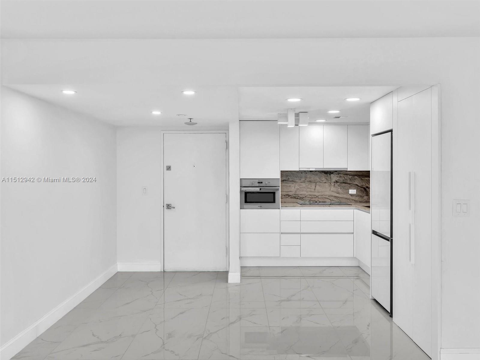 Beautifully Remodeled, Open Kitchen with Quartz countertops and High End appliances