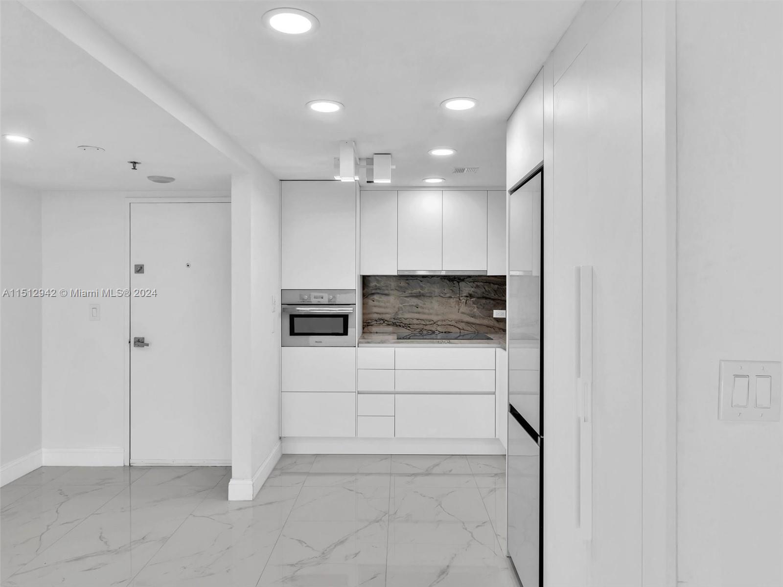 Beautifully Remodeled, Open Kitchen with Quartz countertops and High End appliances