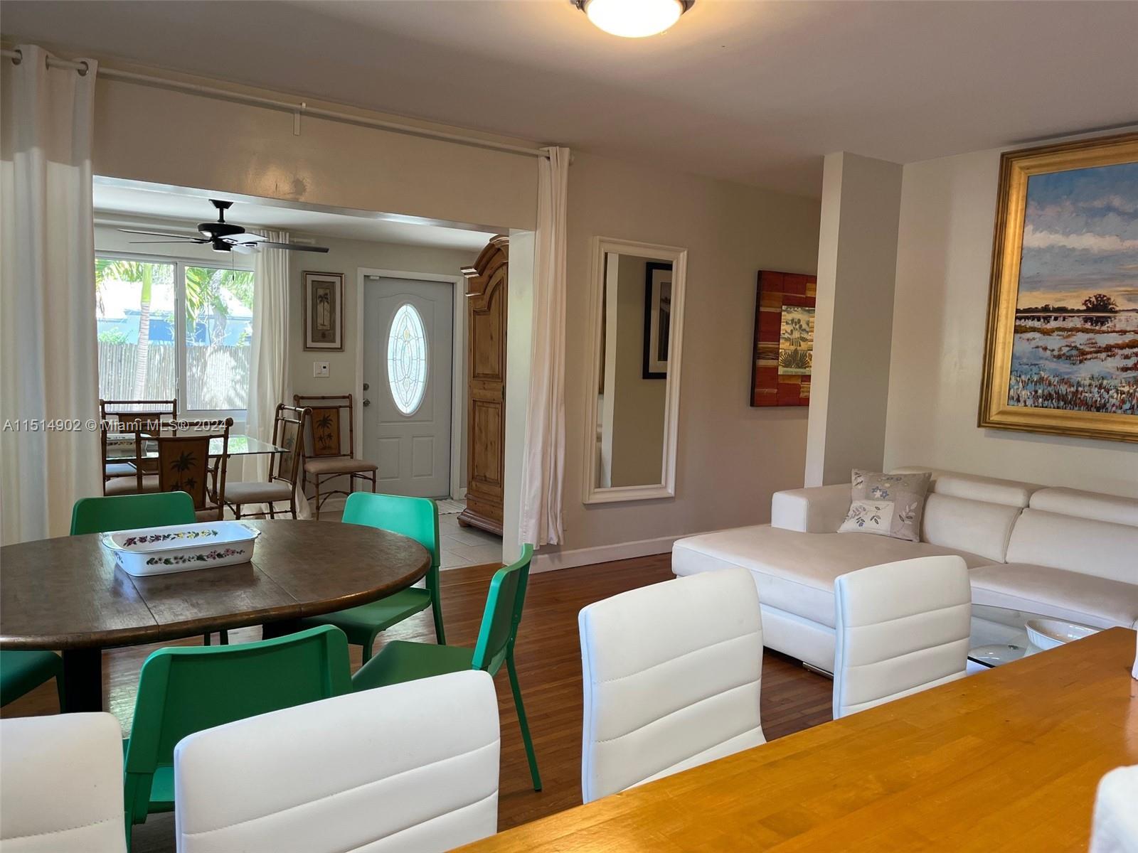 Florida room is set up with a dining table right now.