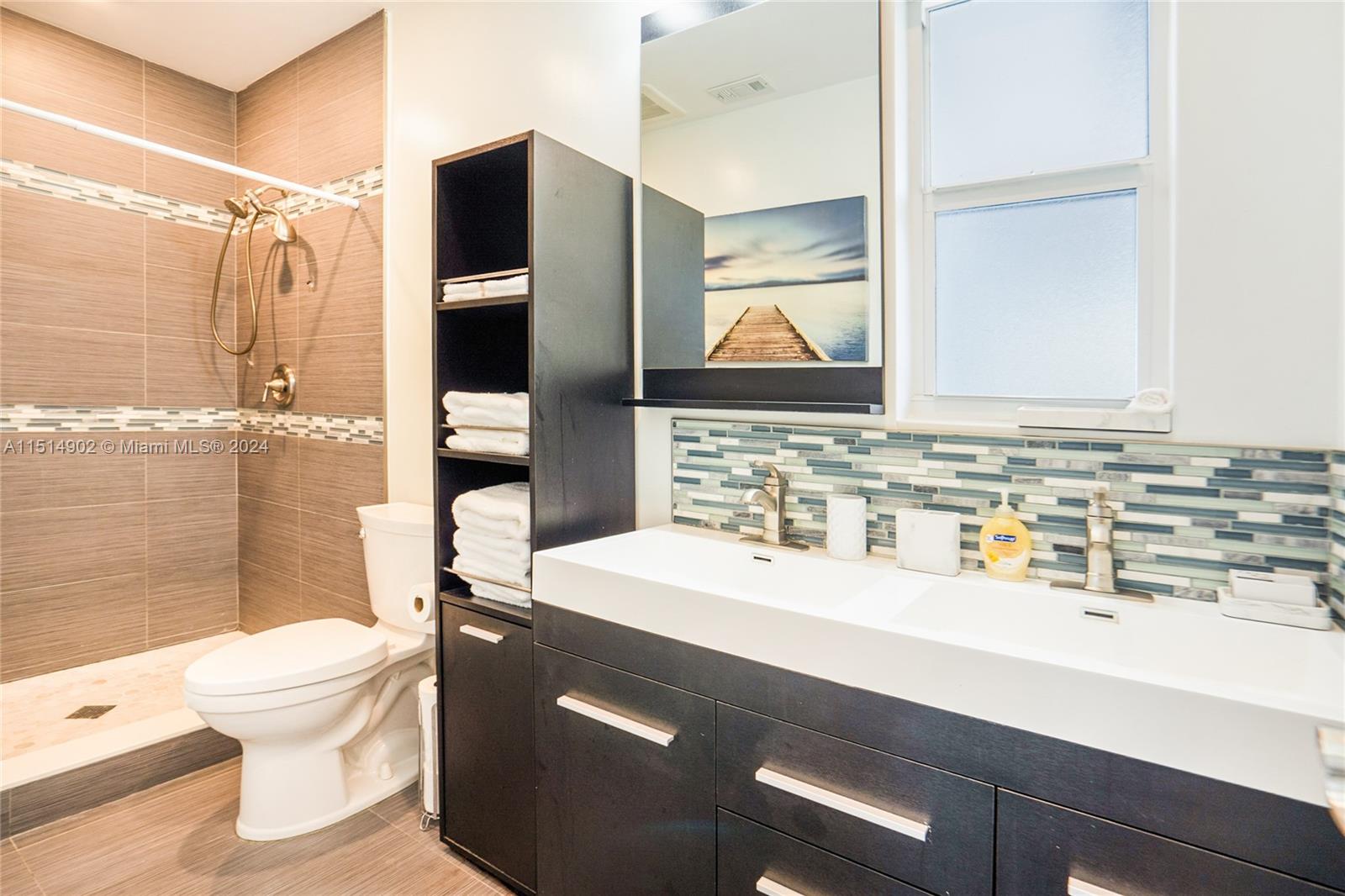 Separate bedroom at rear entrance by the outdoor covered porch. This bedroom has 2 queen size beds now