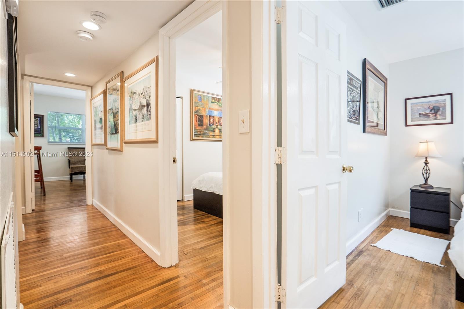 Entrance to driveway and front yard leading to front entrance