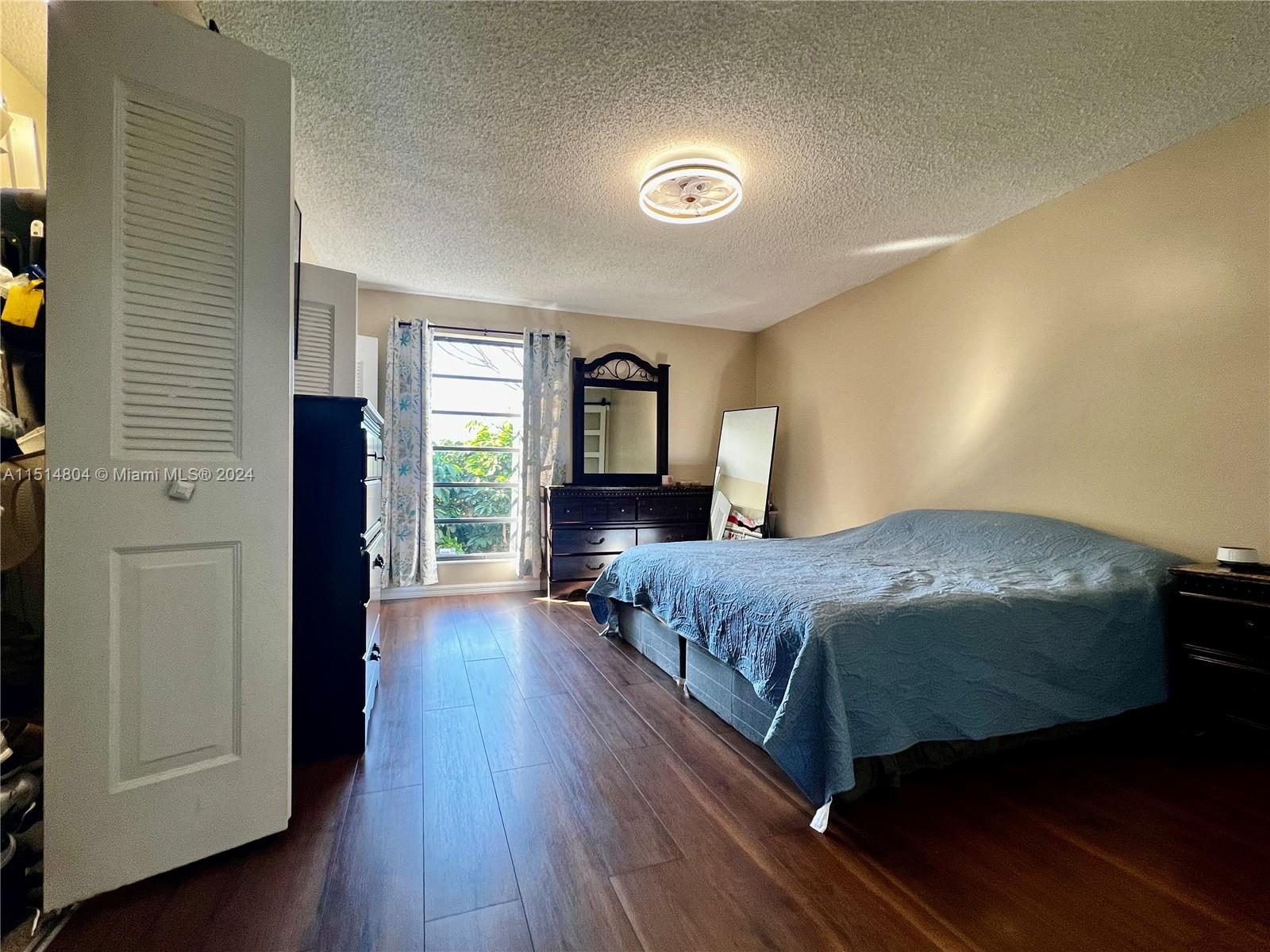 Primary bedroom view to the lake.