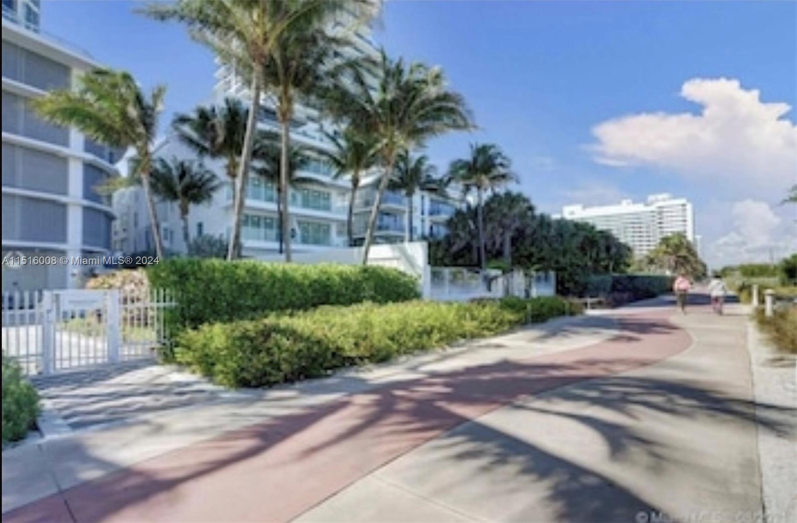Boardwalk between building and the beach