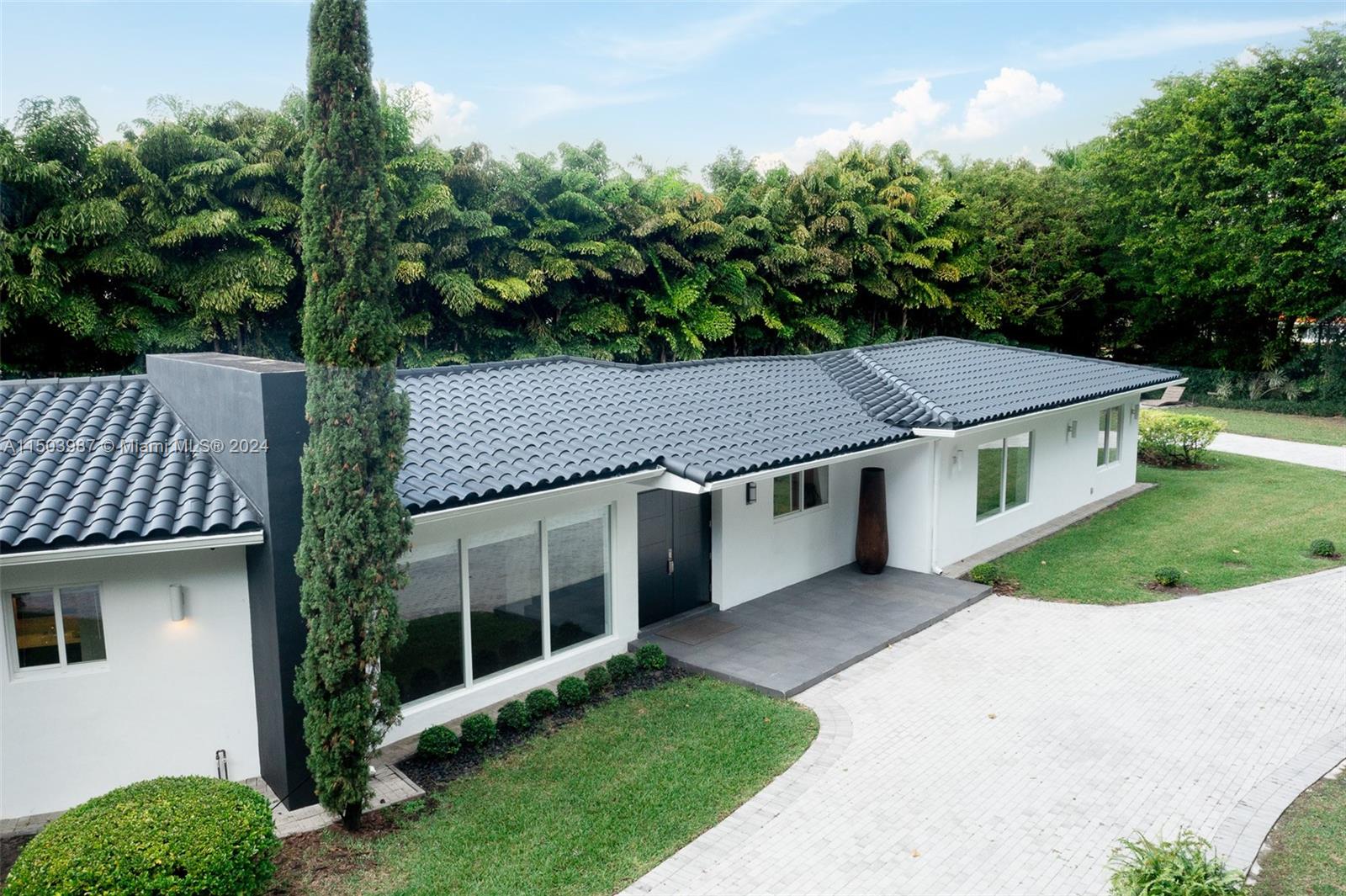 Meticulously remodeled 4,481 SF residence located in the heart of Coral Gables. This walled one-acre corner lot has 4 bedrooms, 3.5-bathrooms, and the serenity of oak and banyan trees. The exceptional split floor plan showcases thoughtfully located and spacious bedrooms, two primary suites, and 3.5 bathrooms. A gourmet eat-in kitchen offers ample counter space and an oversized walk-in pantry. The beautiful backyard features a pool, covered dining and BBQ space, and lush landscaping providing optimal privacy. Additional features include impact windows and doors and stunning porcelain floors throughout. Close to the best schools, restaurants, parks, and shopping. Also available for rent.
