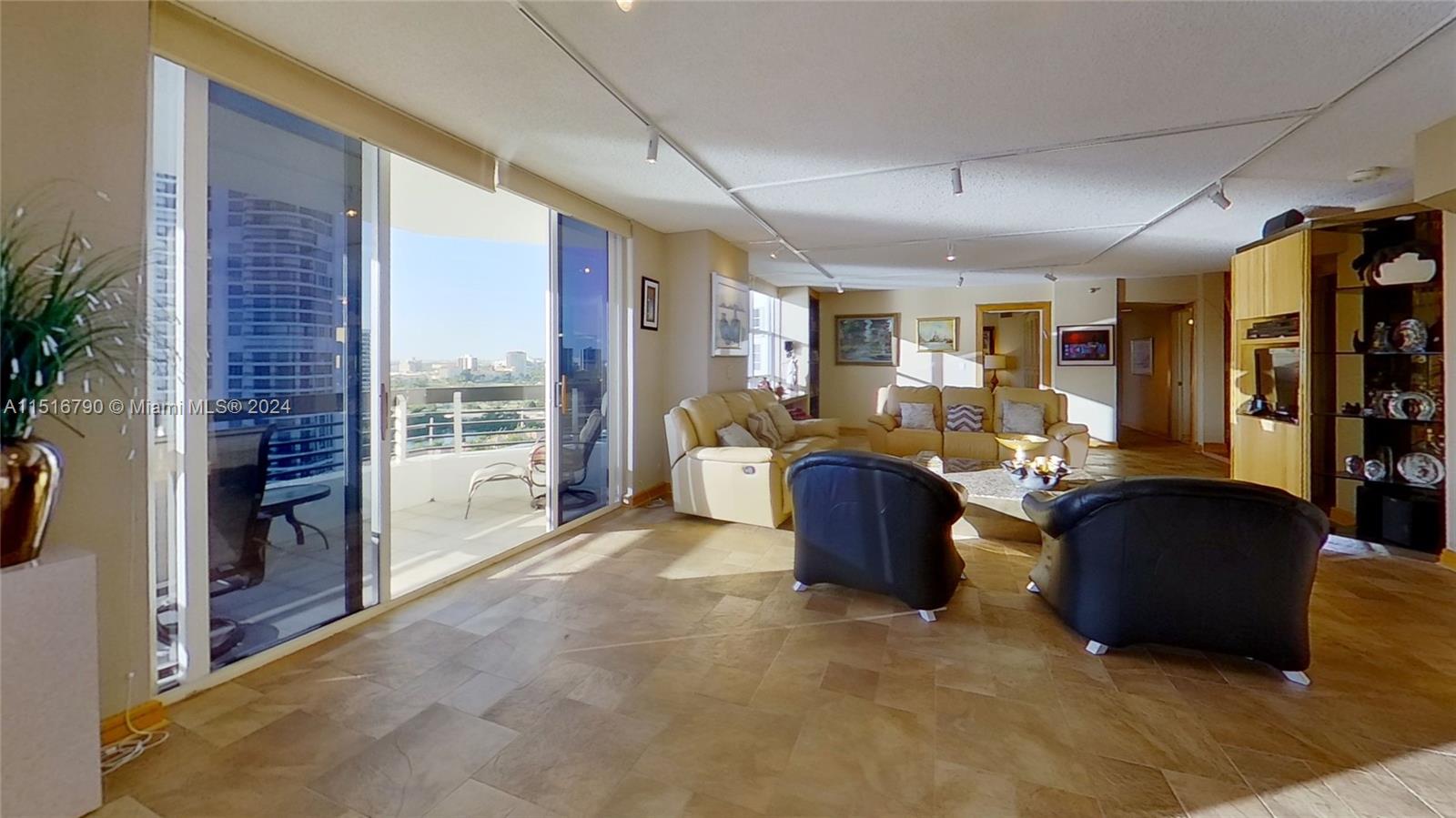  a superb double-sized living room facing south/south-west and leading to a big L shape balcony