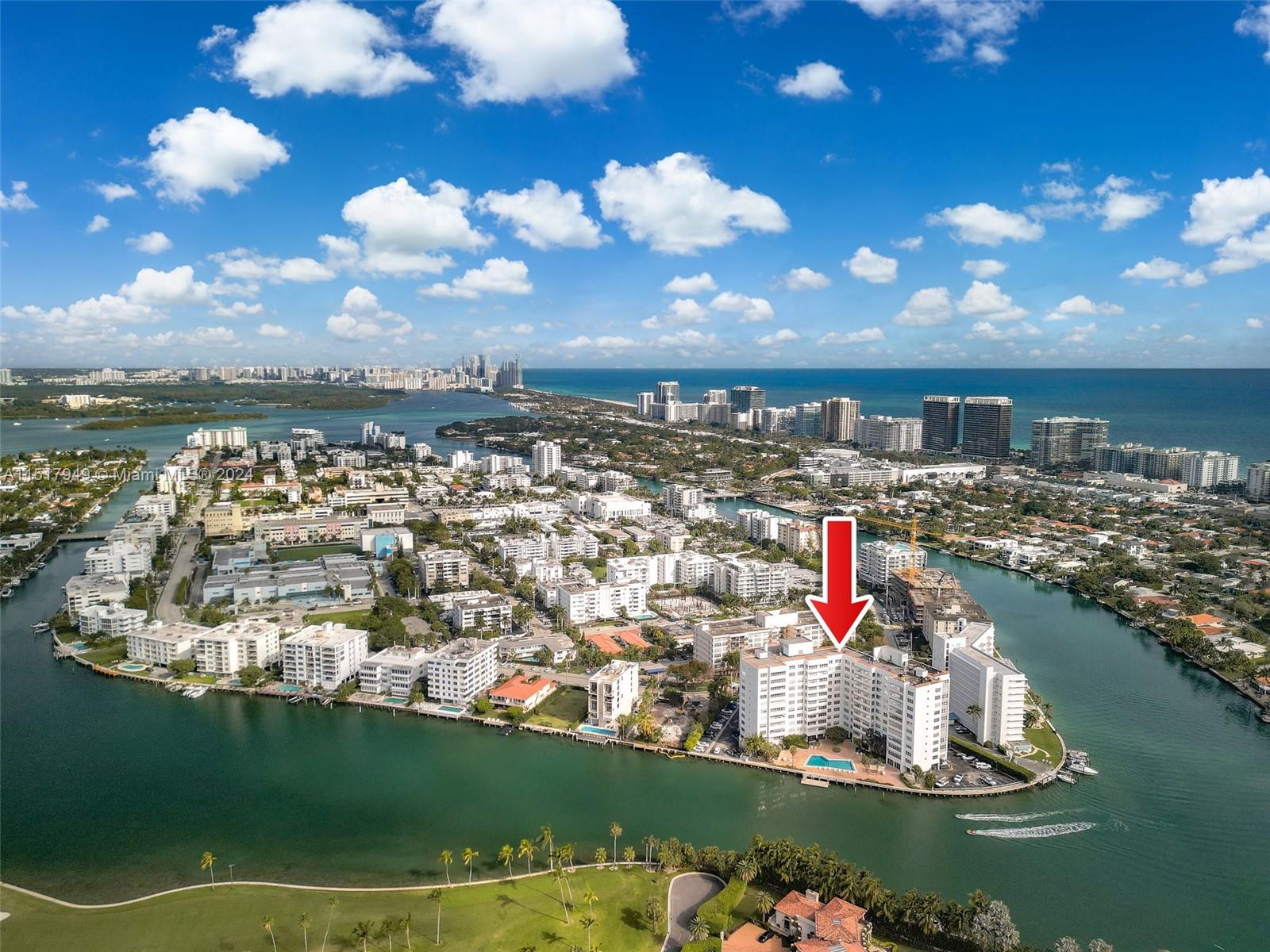 Enjoy panoramic views of Biscayne Bay and Indian Creek golf course from this 1150 SF condo at Blair House, Bay Harbor Islands. Minutes from Bal Harbour and across from the Intracoastal, this bright condo features impact windows, and a large walk-in closet, and is small and dog-friendly.  This 1 bed/den, 1.5 bath unit with 9 ft ceilings can convert to 2/2. Blair House, a mid-century icon, offers ample storage, impact windows, a concierge, free valet,  A/C maintenance, and is close to beaches, Restaurants, Coffee Shops, and shopping. Updated amenities include a new lobby, resort-style pool, and no fixed bridges, perfect for boating enthusiasts. Max occupants 2 people per Florida Statue.