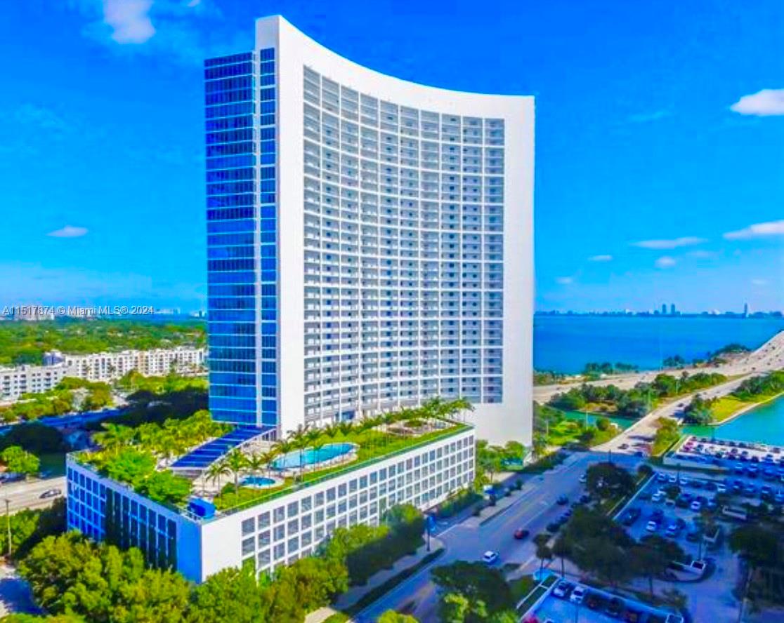 FULLY FURNISHED and REMODELED unobstructed Million Dollar views of Biscayne Bay/Ocean 1Bed, 1.5 Bath, New kitchen appliances cooktop and microwave,new washer/dryer, 1 parking, 1 storage, Elegant white ceramic floors, floor-to-ceiling windows, granite countertop, a private elevator serving only three units per floor, pet-friendly. Resort-style living awaits with 2 pools, hot tubs, a movie theater, Enjoy exercising in one of Miami's finest and well-equipped gyms, sauna, steam room, playrooms, game room, business center, 24/7 concierge, and more. Conveniently located near Design District, Midtown. 5Mi to Miami Beach, 8Mi to MIA airport, 4Mi to Brickell, Mount Sinai Hospital. In excellent condition and ready-to-move-in with only your personal items, this apartment is an exceptional opportunity