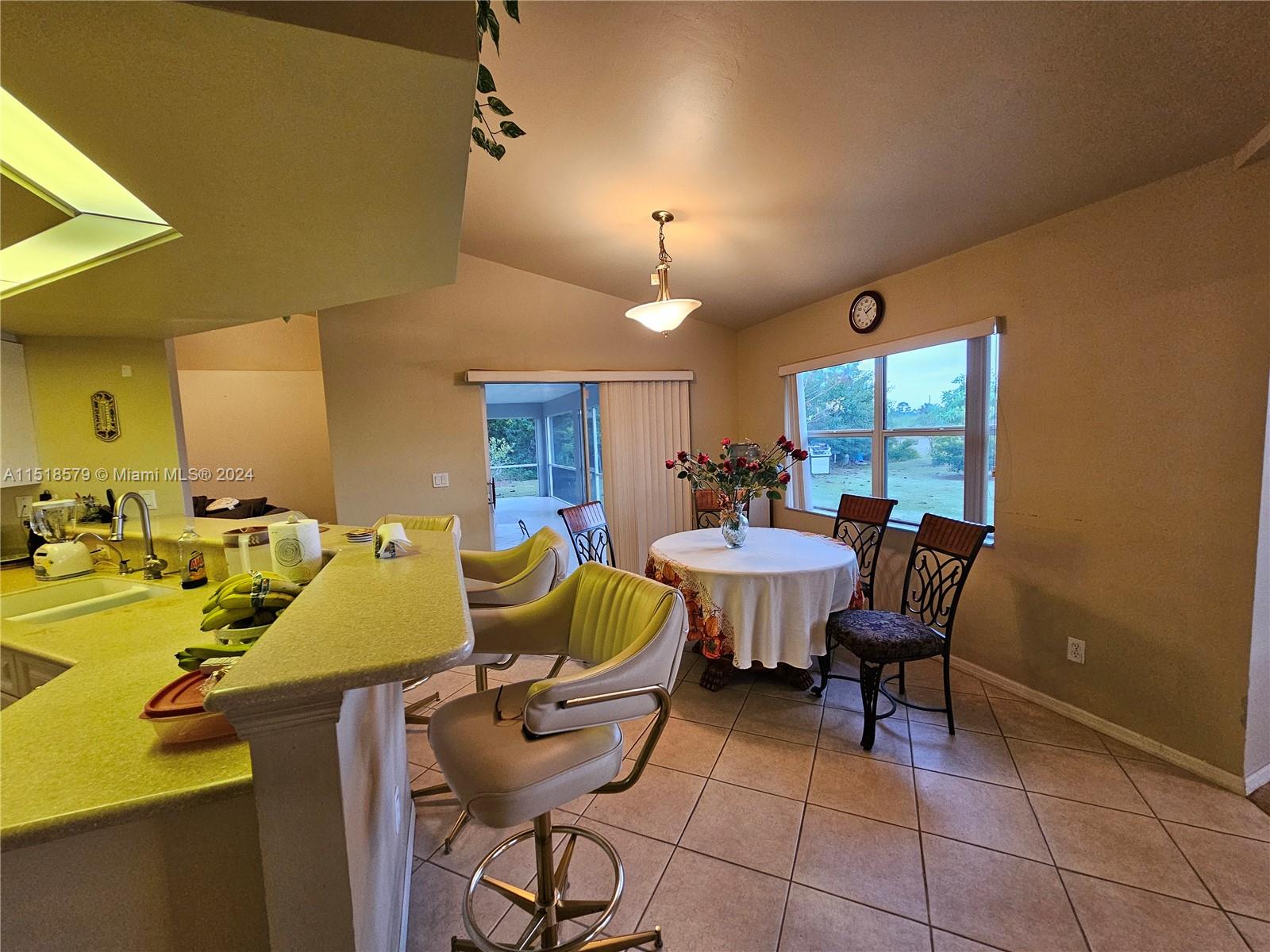 Kitchen, Eat-At or Buffet Counter to Breakfast Area