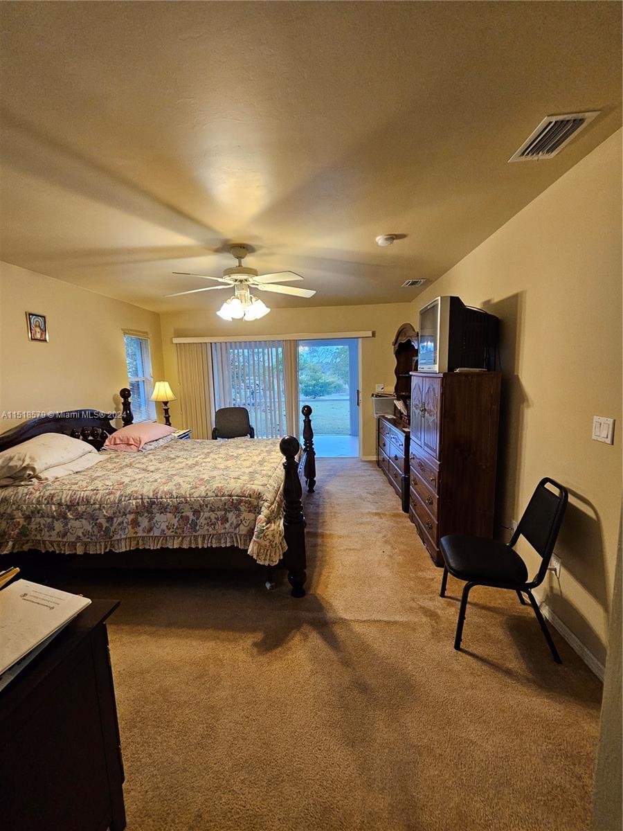 Primary Bedroom to Screened Porch