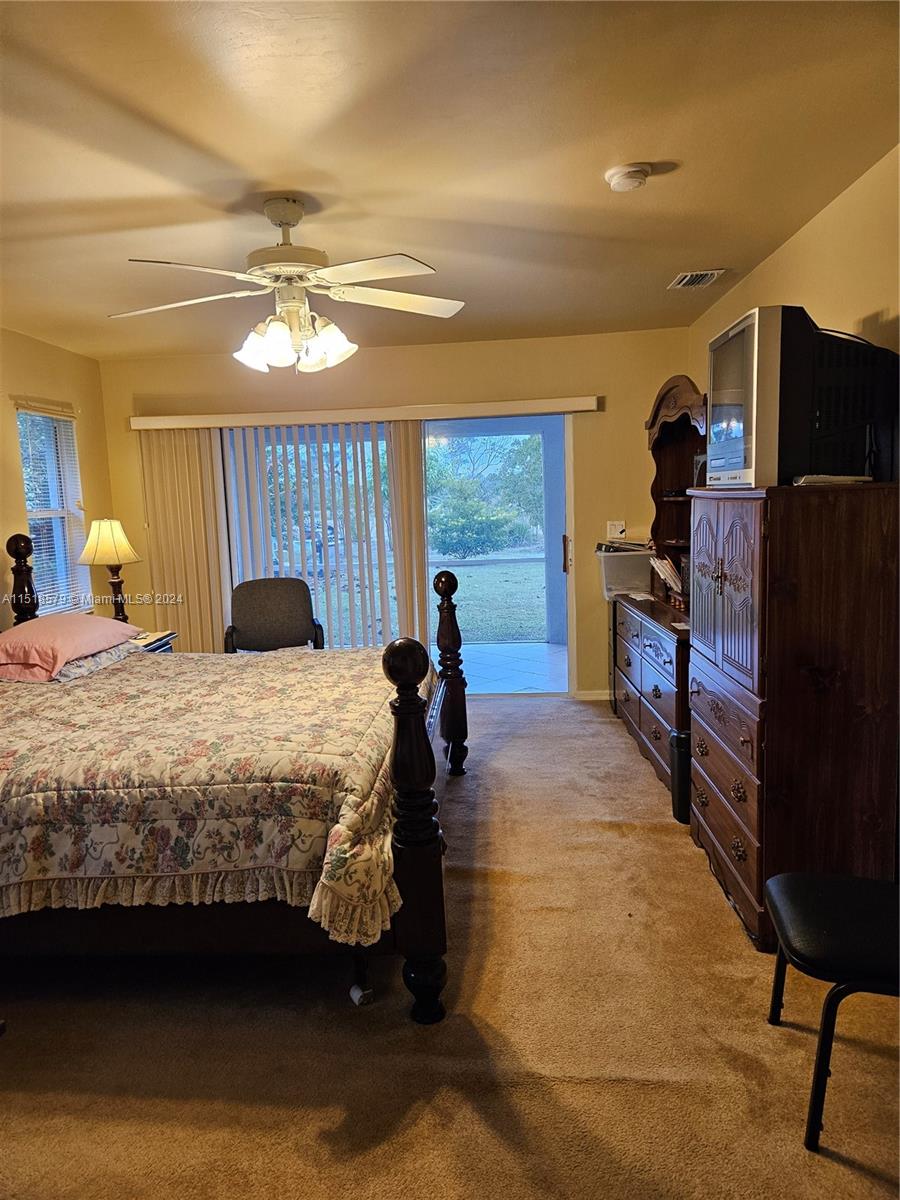 Primary Bedroom to Screened Porch