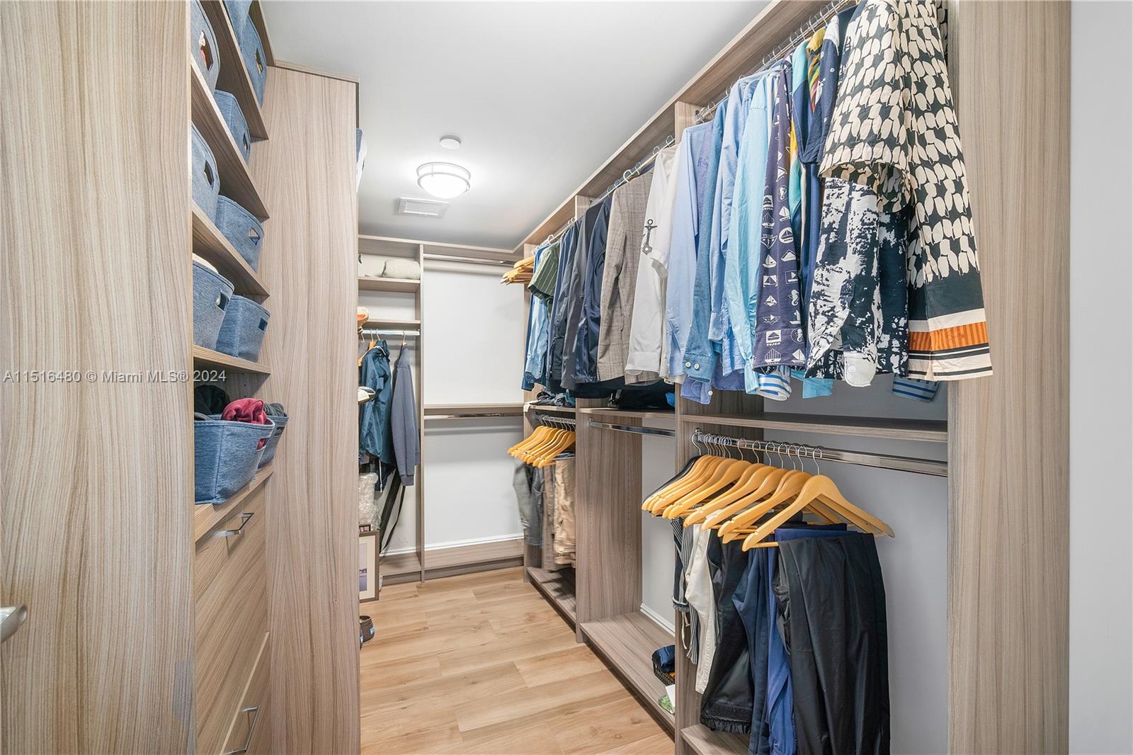 MAIN BEDROOM WITH BUILT IN CABINETRY