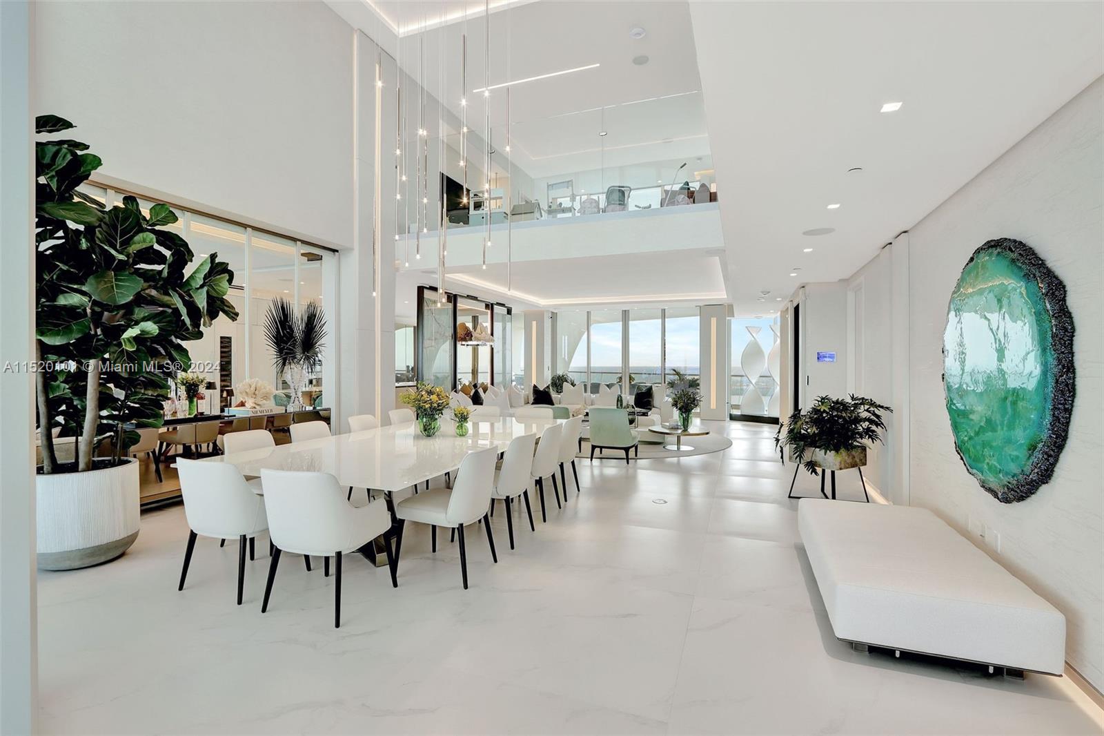 Explore the epitome of elegance in Miami's most enchanting Sky Villa apartment, offering 6,387 SF of air-conditioned space "per dev floor plan" and an additional 4,000 SF of balconies that command panoramic views of the sunrise, sunset, ocean, and cityscape. This residence comprises five bedrooms, a maid's quarter, an outdoor gourmet kitchen, a private gym, and a secluded sauna. Impeccably furnished and professionally designed by the acclaimed architect and designer, Mirta Ariaran. This top-tier, 5-star resort-style condominium features exclusive amenities, including a private restaurant, bar, gym, full-service spa with, saunas, and a hot tub. Additionally, it boasts a private beach pavilion with beach services, heated pool, library, billiard room, play areas, and a teen room.