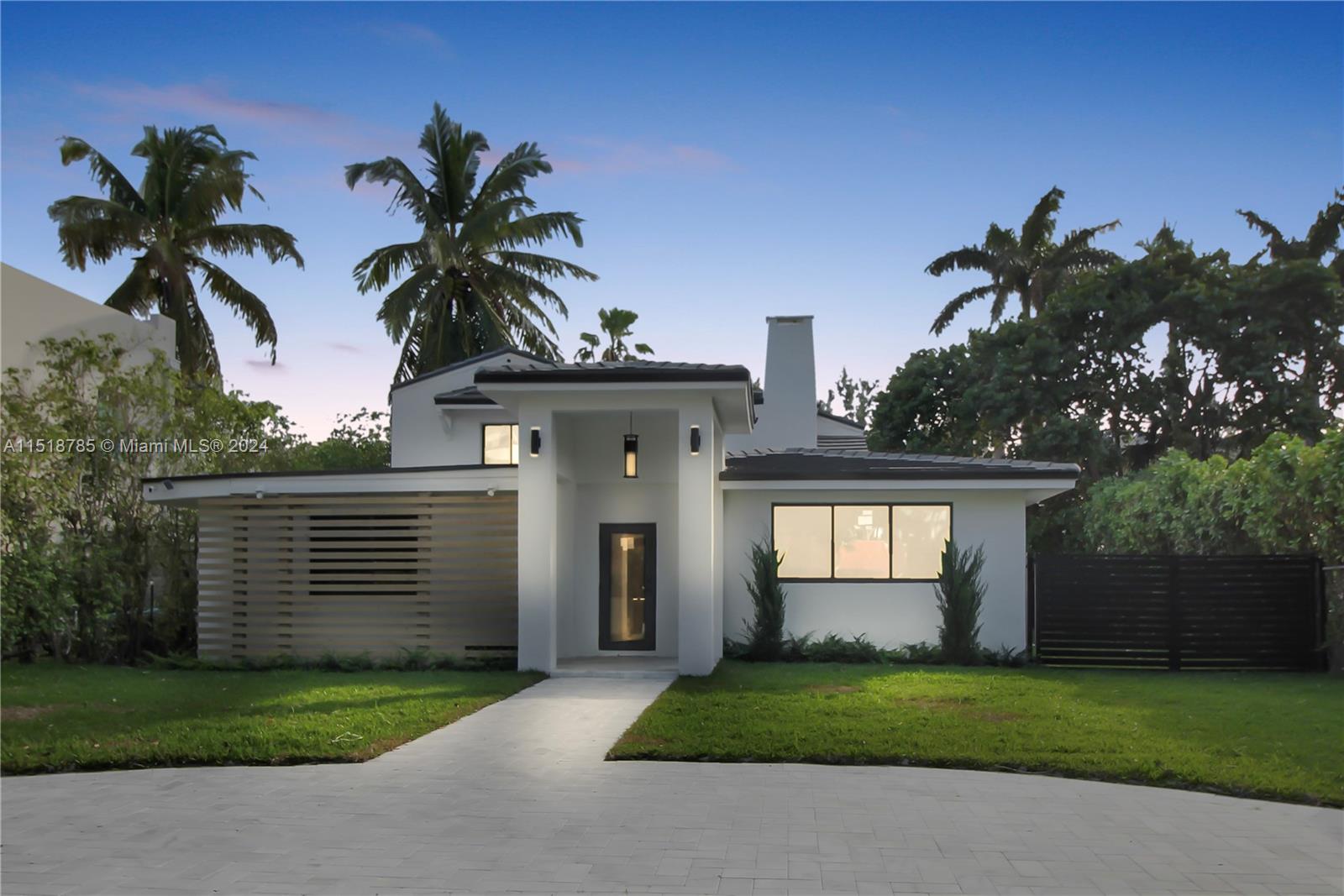 This modern home in Nautilus offers an estate privacy fence, marble drive way with multi-car parking, marble patio, putting green, new sod, and so much more.  Pool permit submitted.