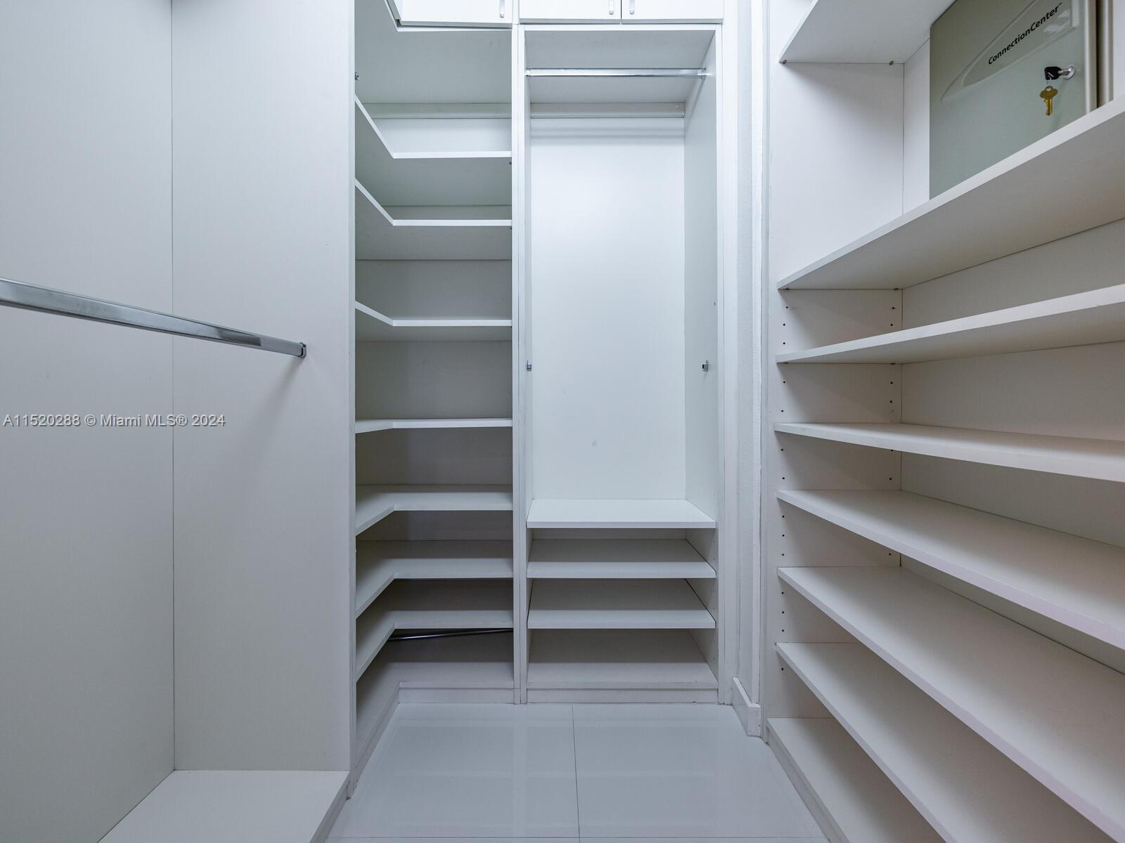 Main Suite Walk-in Closet with Custom Built-ins