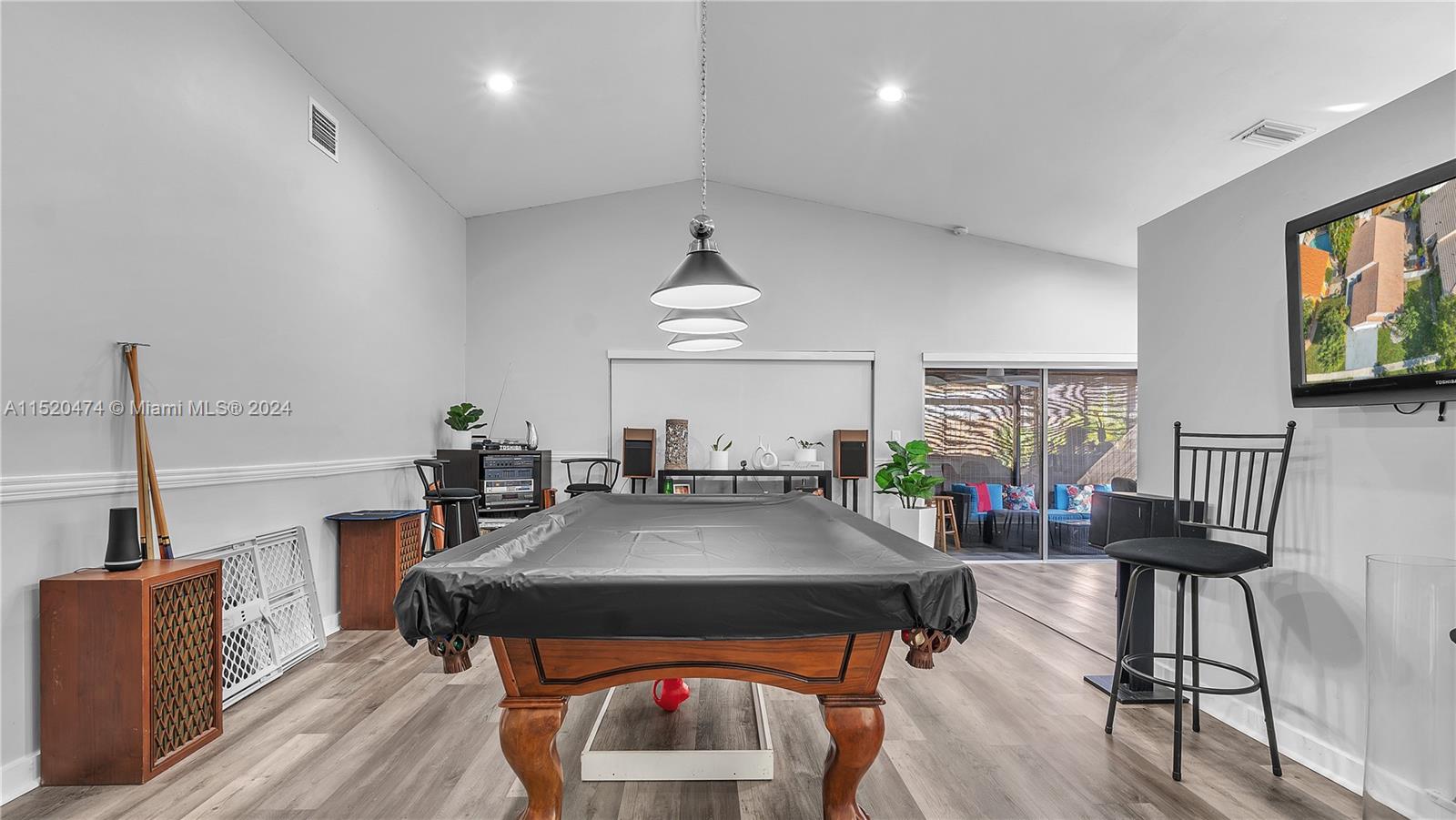 Dining area that  is currently use as a Game Room