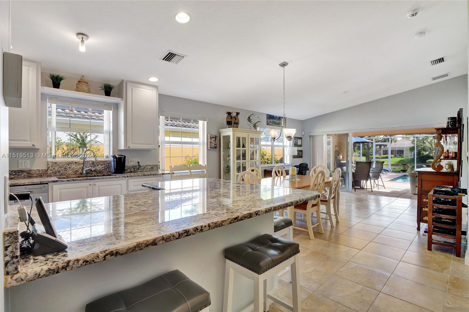 Alt view of bar/island overlooking dining area