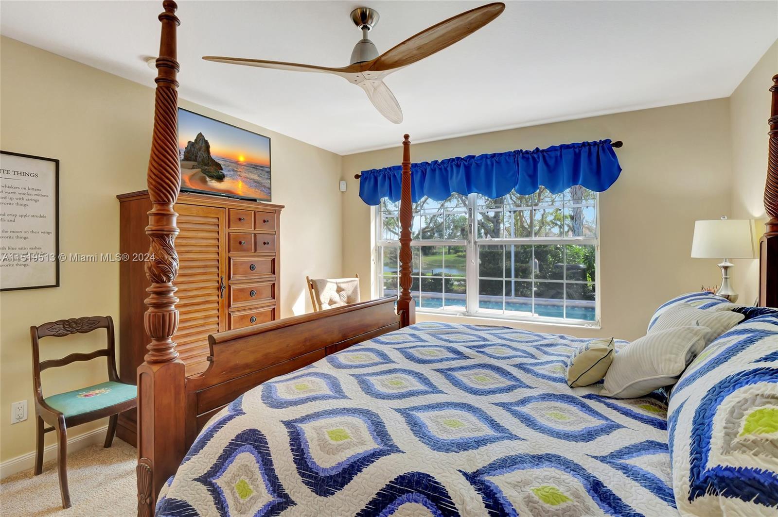 Primary bedroom overlooking the pool