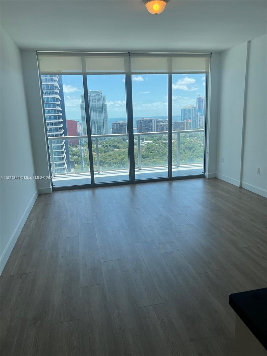High floor 2/2 split plan with gorgeous south facing/water views. Floor to ceiling window and private access to the balcony from all bedrooms and living room. WOOD FLOORS. European cabinetry, Stainless steel appliances. Wide balconies. BEST LOCATION in the heart of Brickell. Steps to Mary Brickell Village. Across from people and metro rail. Luxury building designed by award winning Arquitectonica.