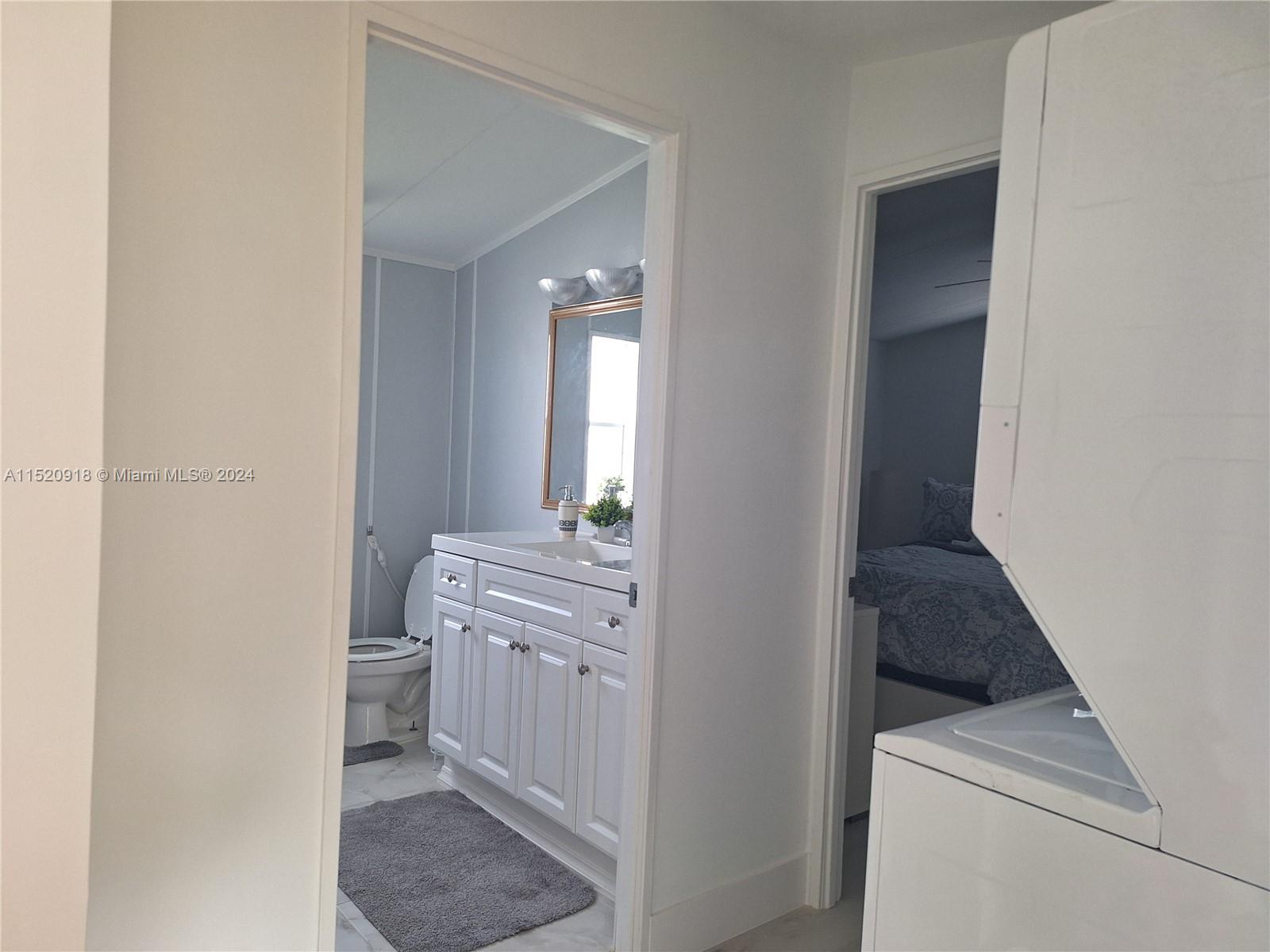 Second Bathroom next to the Washer and Dryer