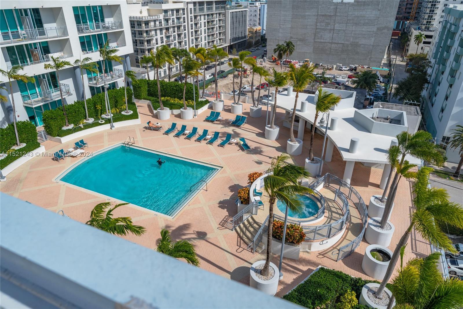 Lounge by the resort style pool and jaccuzi.