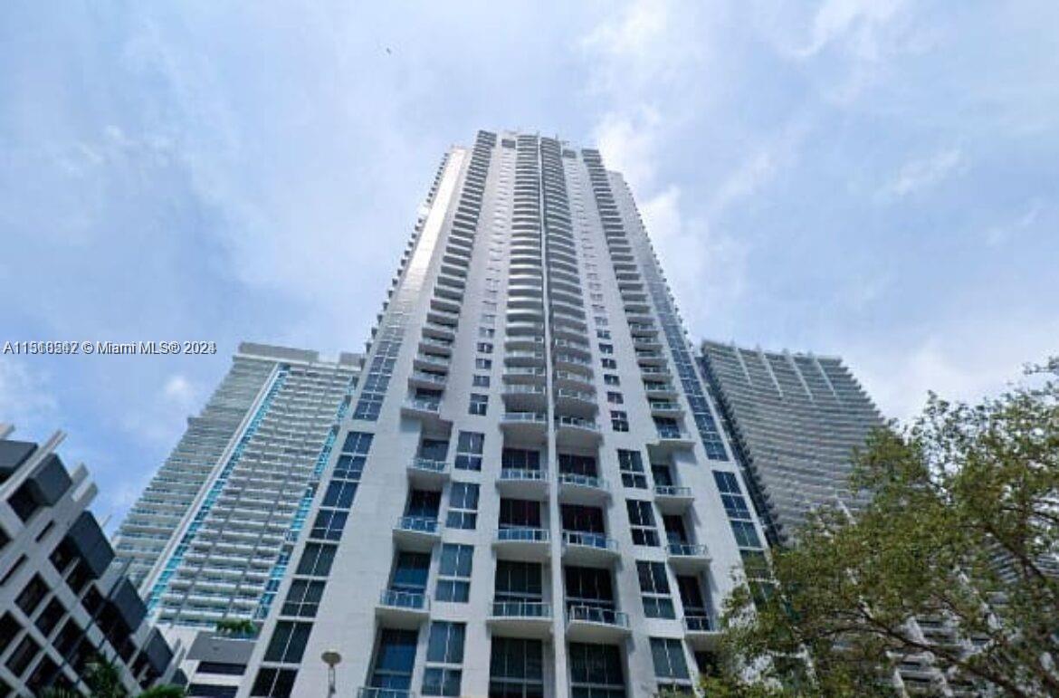 Spacious bi-level loft in the heart of Brickell.  Enjoy great city life with views of the urban core of Miami's Brickell neighborhood. Two-floor unit with 18 foot ceilings, floor to ceiling windows, open L-style kitchen with Italian-style design cabinetry, one full bathroom with glass-enclosed shower and laundry closet downstairs, and open and spacious balcony overlooking the heart of it all. Amenities included assigned parking, 24hr security, concierge, front desk and valet, heated pool, fitness center, steam room, wine/cigar lounge, game room and party room; definitely one of the most full service buildings. Steps to Mary Brickell Village and Brickell City Center and brisk walk to 10th Street Station MetroMover; 20 minutes to South Beach and MIA. Live in the heart of Miami's Brickell.
