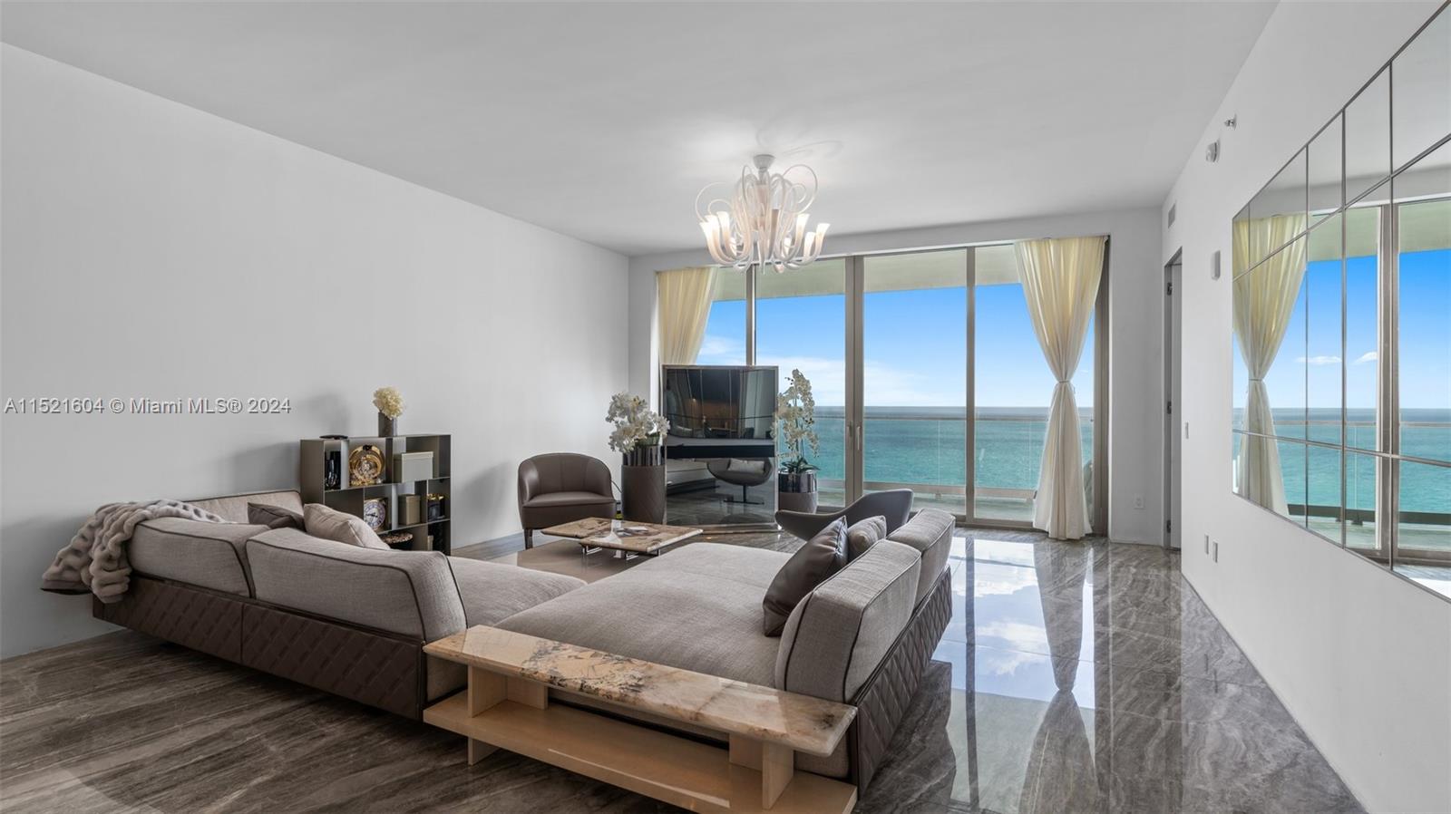 This gorgeous oceanfront condo at one of the top luxury buildings in Sunny Isles boasts more than 3000 sq ft 3 BD 5.5 BA and feels like a single family home in the sky. With private foyer & elevator, bright open east to west flow thru floor plan, top quality finishes, 10 ft ceilings, 2 X-large balconies, offering the most magnificent views of the ocean, bay & the intracoastal. Top of the line Italian custom built-in closets, high-end Italian porcelain floors, custom-made window treatments, high impact windows, ultra modern kitchen w/European-design cabinetry, Wolf appliances, Sub Zero refrigerator & wine cooler. 35,000 Sq. Ft of luxury amenities: Oceanfront Resort Style Pool, Bar, State-of-the-art Fitness Center, 2-story Spa, children's play room, cigar lounge. Best schools.