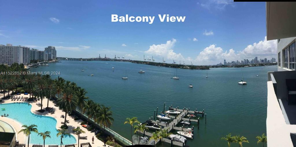Renovated 2/2 with a balcony and the best line view of the water offered in the building.  Other 2/2's in the building, not in this line, do not have the direct beautiful views as this one does of the pool, intercoastal waterway, Miami Beach islands, beautiful west sunsets and downtown miami lighting up at night!