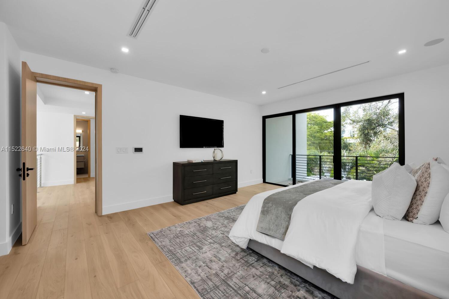 Primary suite with wrap around balcony (staged)