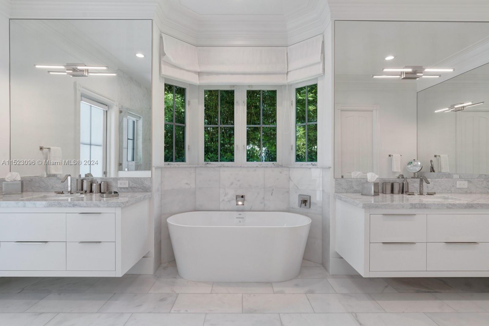 His & Her sinks with freestanding tub