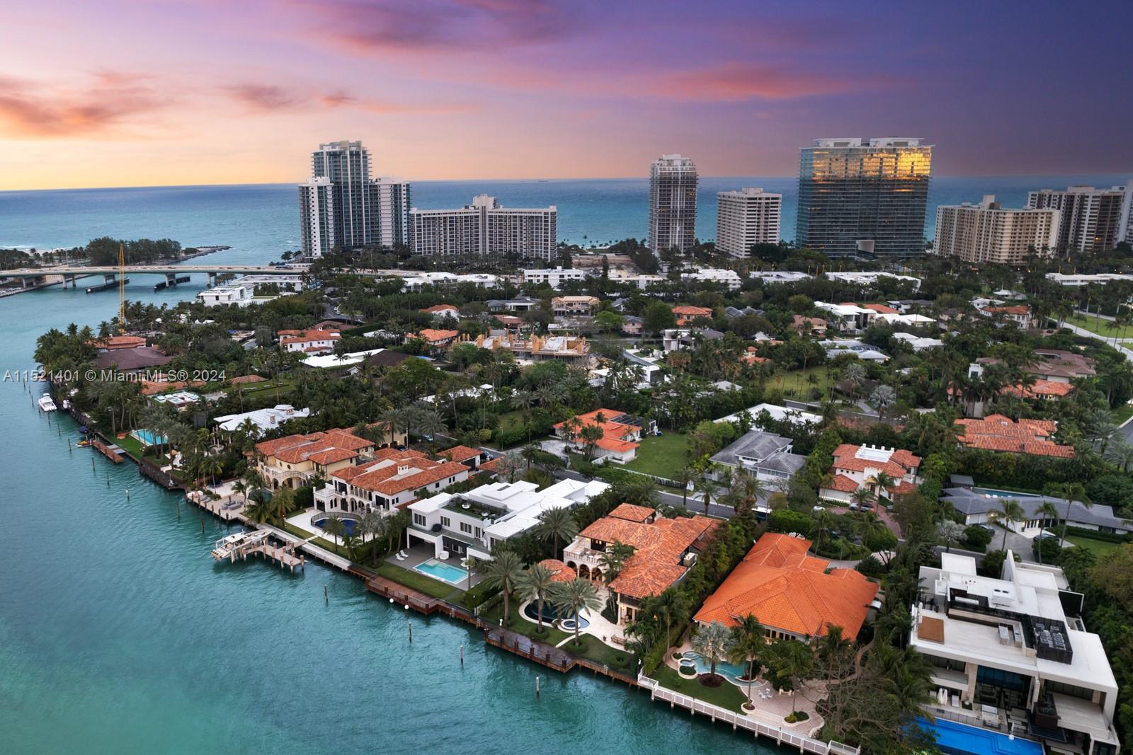 Welcome to this timeless Mediterranean waterfront estate in the exclusive guard-gated neighborhood of Bal Harbour Village. This home is one of only ten wide-bay West-facing homes, custom built by Alexander Group. It features a home theater, gym, office, & chef's kitchen, all featuring a combination of custom millwork, Jerusalem stone flooring, & marble accents throughout. Benefiting from Western exposure, the exterior of the property boasts glamorous sunsets over the Intracoastal waterway. With 100 ft. of water frontage, pool, spa, summer kitchen, expansive patio & a private dock, this home is a true outdoor paradise. Enjoy the convenience of being just minutes away from world-class shopping at the Bal Harbour Shops, fine dining, & beaches. This is more than just a home; it's a lifestyle.