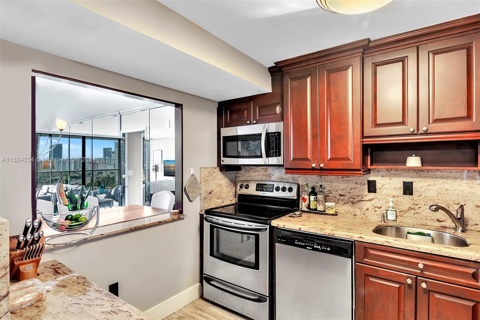 Tastefully Remodeled Kitchen, Granite counters and stainless steel appliances.