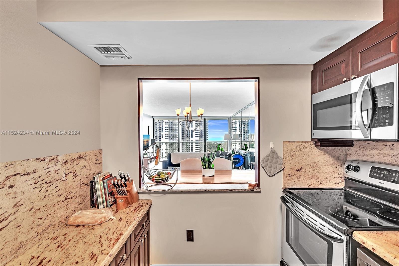 Tastefully Remodeled Kitchen, Granite counters and stainless steel appliances.