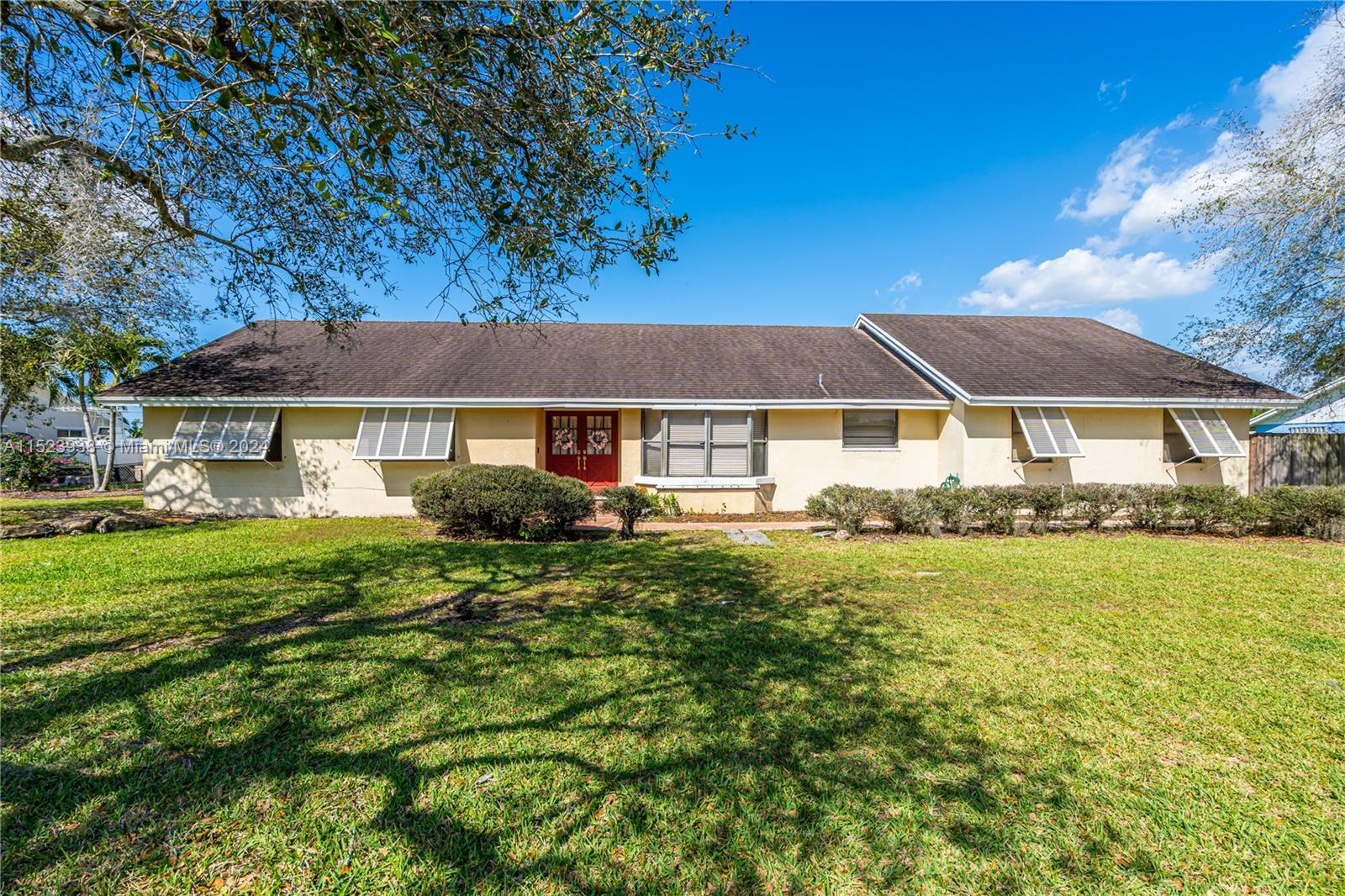 Charming single-family home nestled in the Redlands near the heart of Homestead. This Westbury Estates home boasts a picturesque neighborhood with tree-lined streets, a 28,000 sqft lot, two sheds, four bedrooms, three bathrooms, and plenty of space for your boat, RV, or other toys. Make this spacious floor plan your own! Seller is motivated.