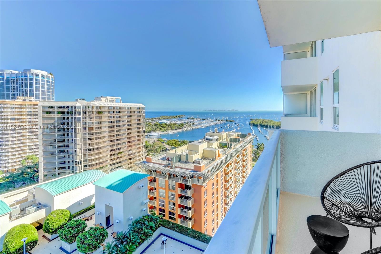 Contemporary corner unit w/ bay & city views and wrap-around balcony in Arya, a full-service luxury condo/hotel in the heart of Coconut Grove’s village. Walk to galleries, boutiques, cafes and bayfront parks. Updated, light-filled interior spaces & a split-floorplan layout w/option to live in or rent as a 1BR/2BA+ kitchen & living area or as 2 separate 1BR/1BA units.  No rental restrictions. Offered fully furnished w/chic designer pieces for the ultimate in turn-key living. Exceptional building amenities include heated pool & restaurant overlooking the bay, fitness center w/sauna, squash courts, business center & 24 hr. attended lobby w/concierge. Secure garage parking (1 assigned space) as well as valet & street parking. Minutes to downtown, MIA, Brickell, Key Biscayne & the Beaches.