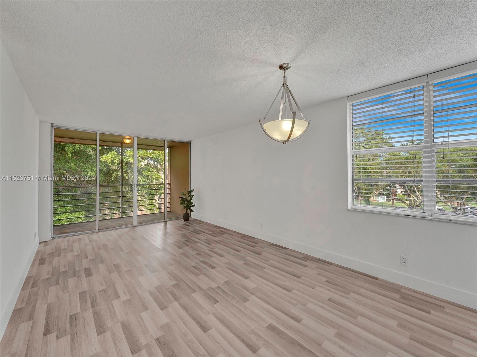 9440 Live Oak Pl 401, Davie, FL 33324, 2 Bedrooms Bedrooms, ,2 BathroomsBathrooms,Residential,For Sale,Live Oak Pl,A11523751