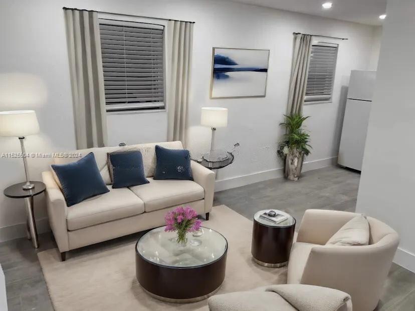 The unit is UNFURNISHED- This photo is VIRTUAL STAGED FOR VISUALIZATION