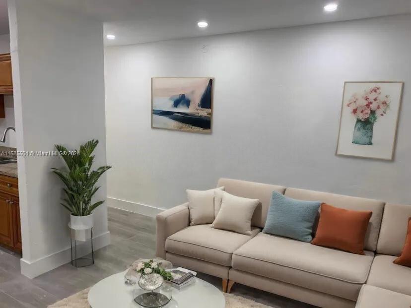 The unit is UNFURNISHED- This photo is VIRTUAL STAGED FOR VISUALIZATION