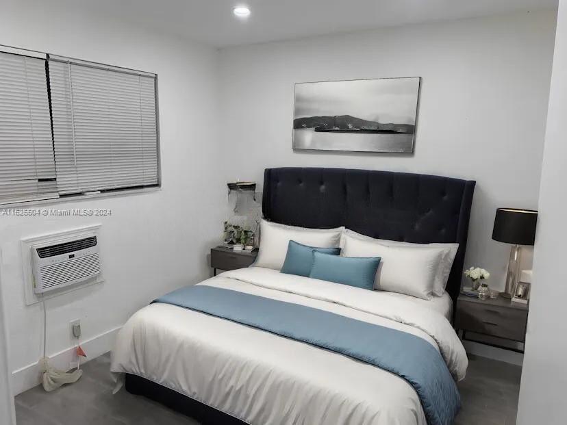 The unit is UNFURNISHED- This photo is VIRTUAL STAGED FOR VISUALIZATION