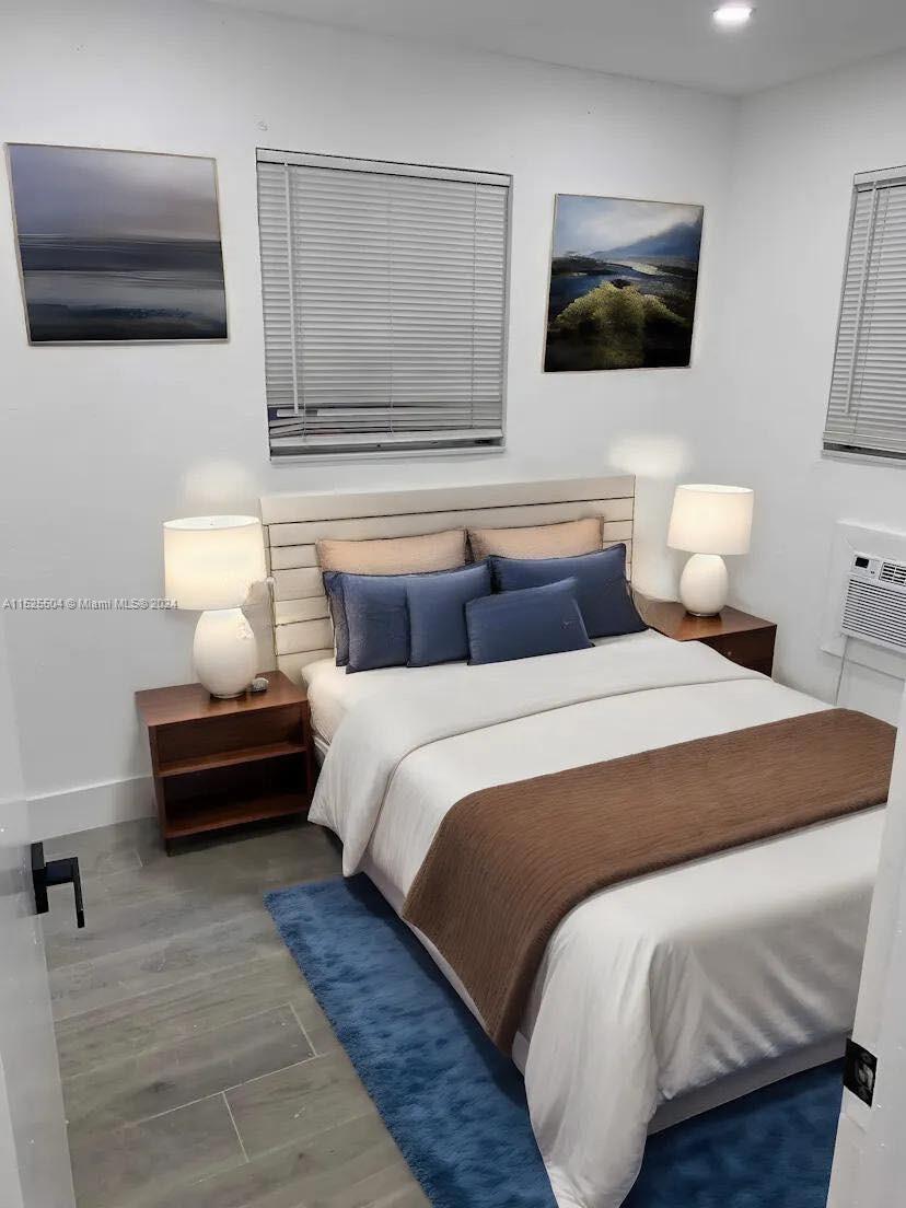 The unit is UNFURNISHED- This photo is VIRTUAL STAGED FOR VISUALIZATION