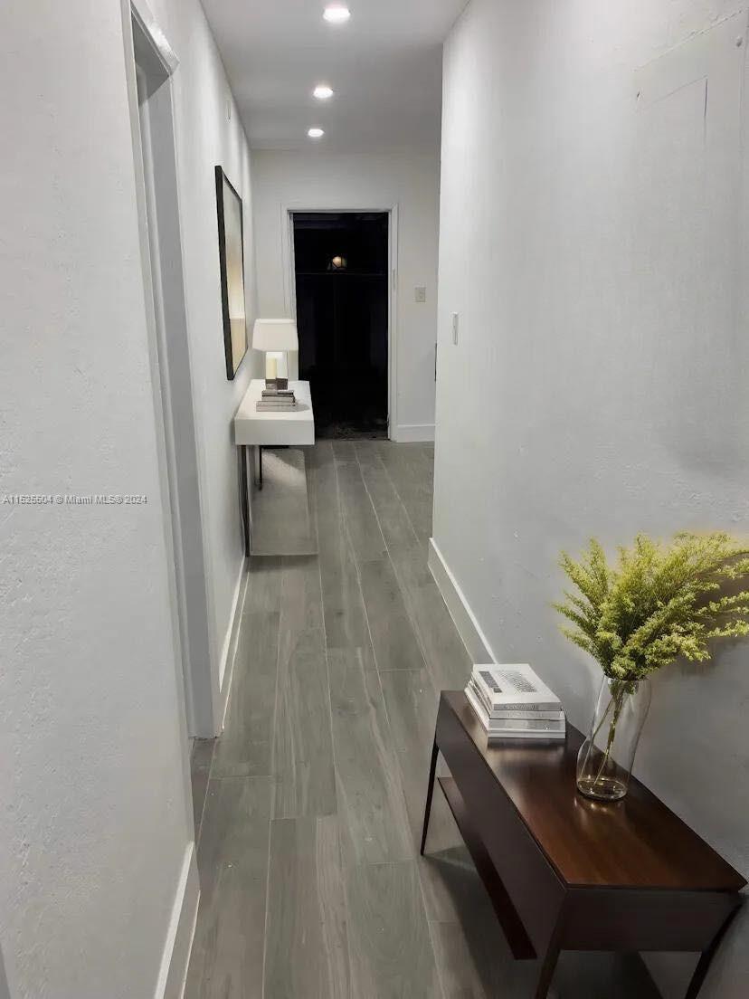 The unit is UNFURNISHED- This photo is VIRTUAL STAGED FOR VISUALIZATION