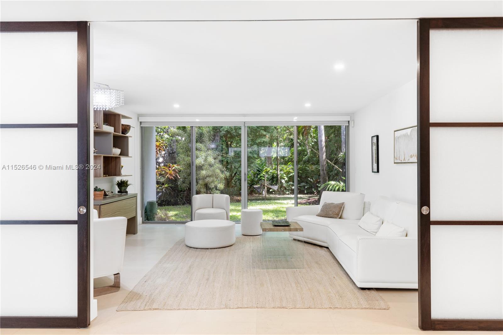 Sitting room with sliding walls partially closed